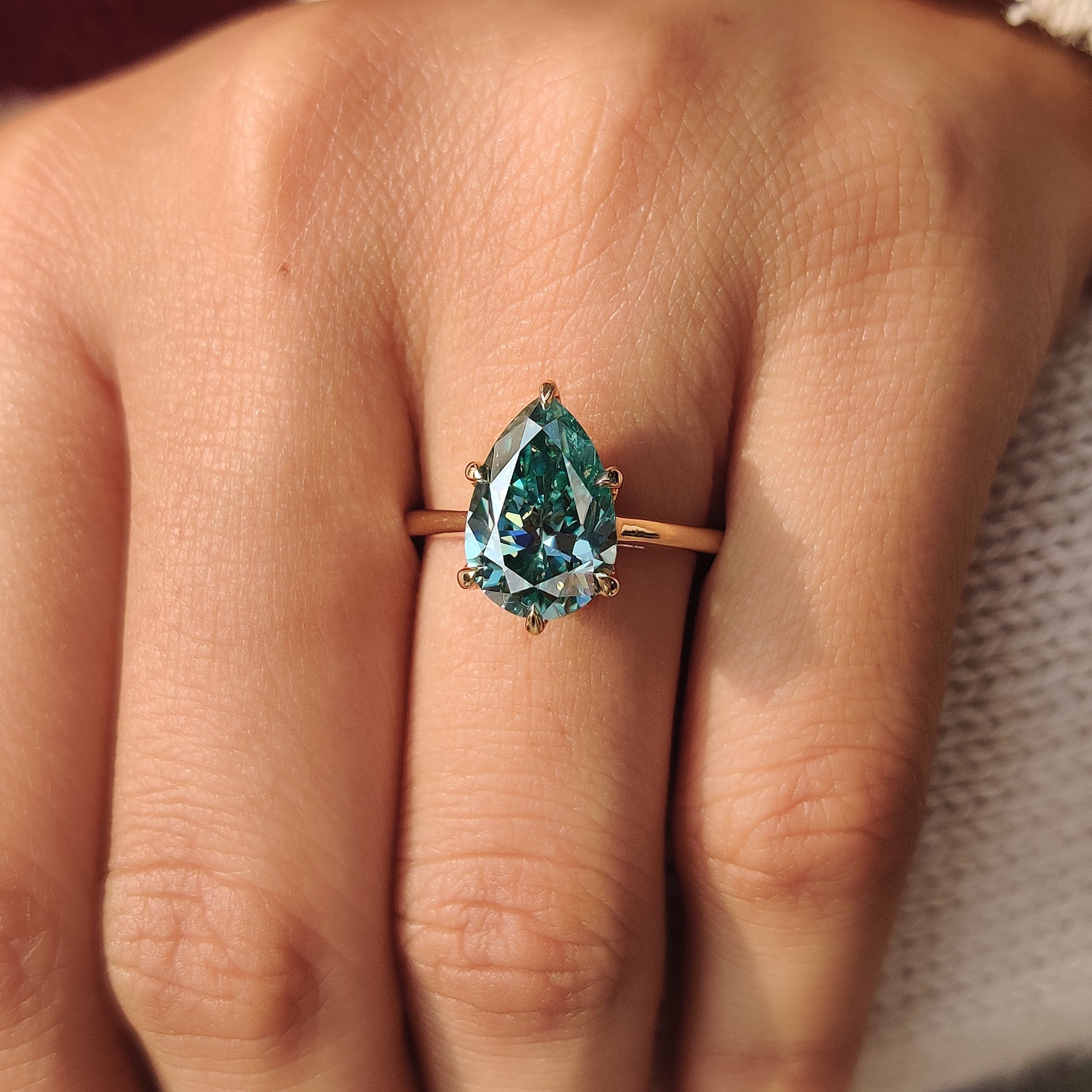 Pear ring with six prong and basket setting.
