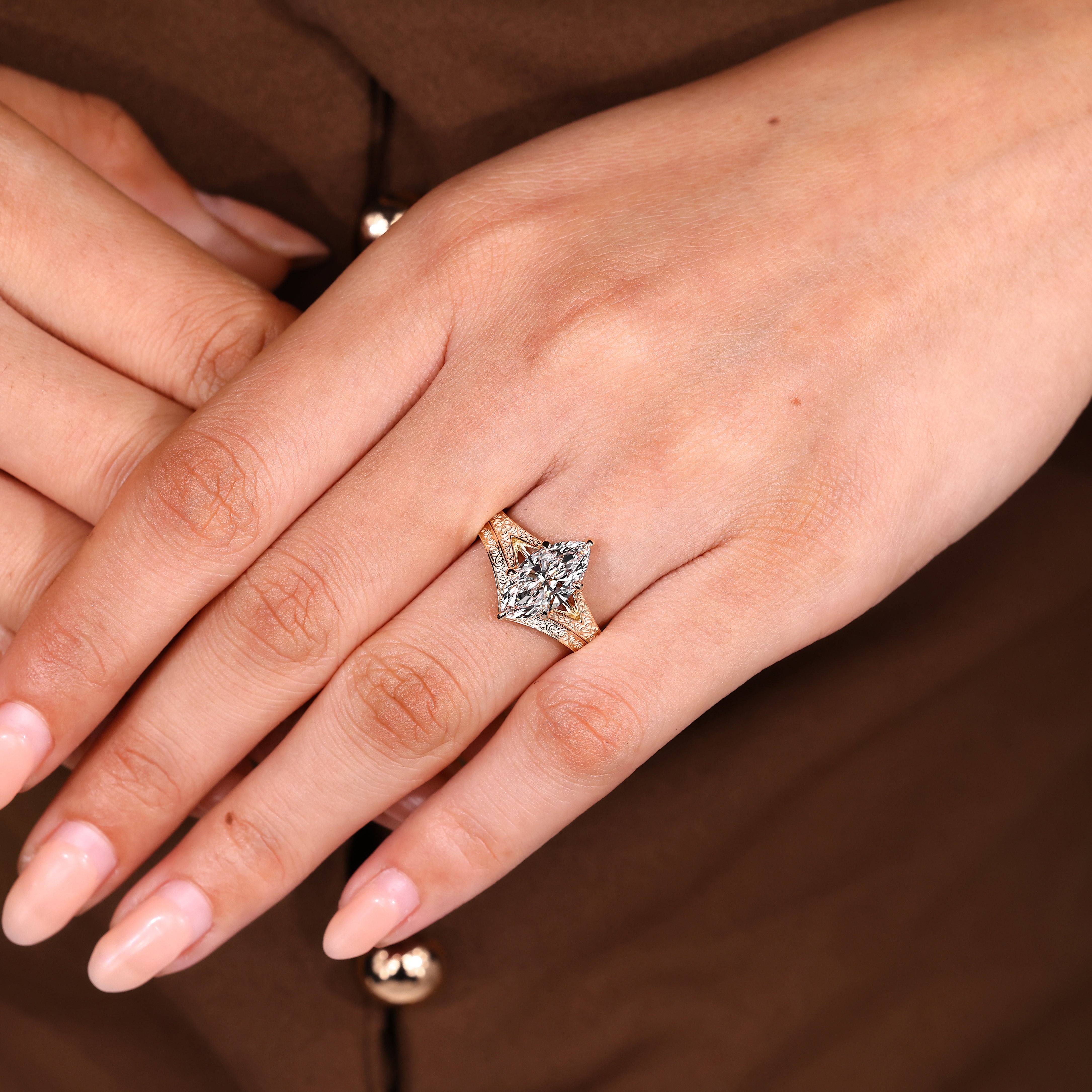 Unique marquise Lab Grown Diamond ring in a tulip setting with curved bands
