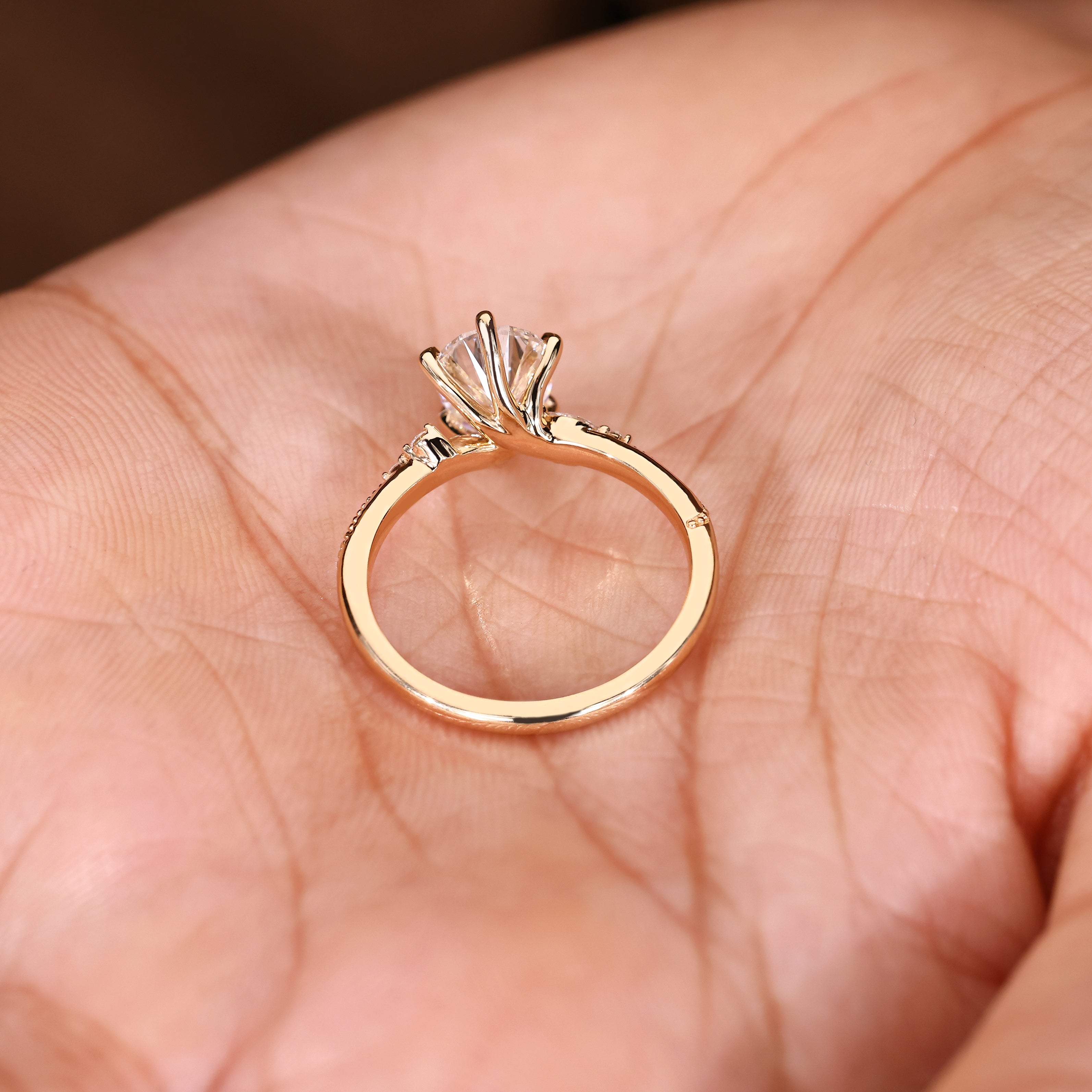 Vintage pear diamond ring with milgrain and claw prongs
