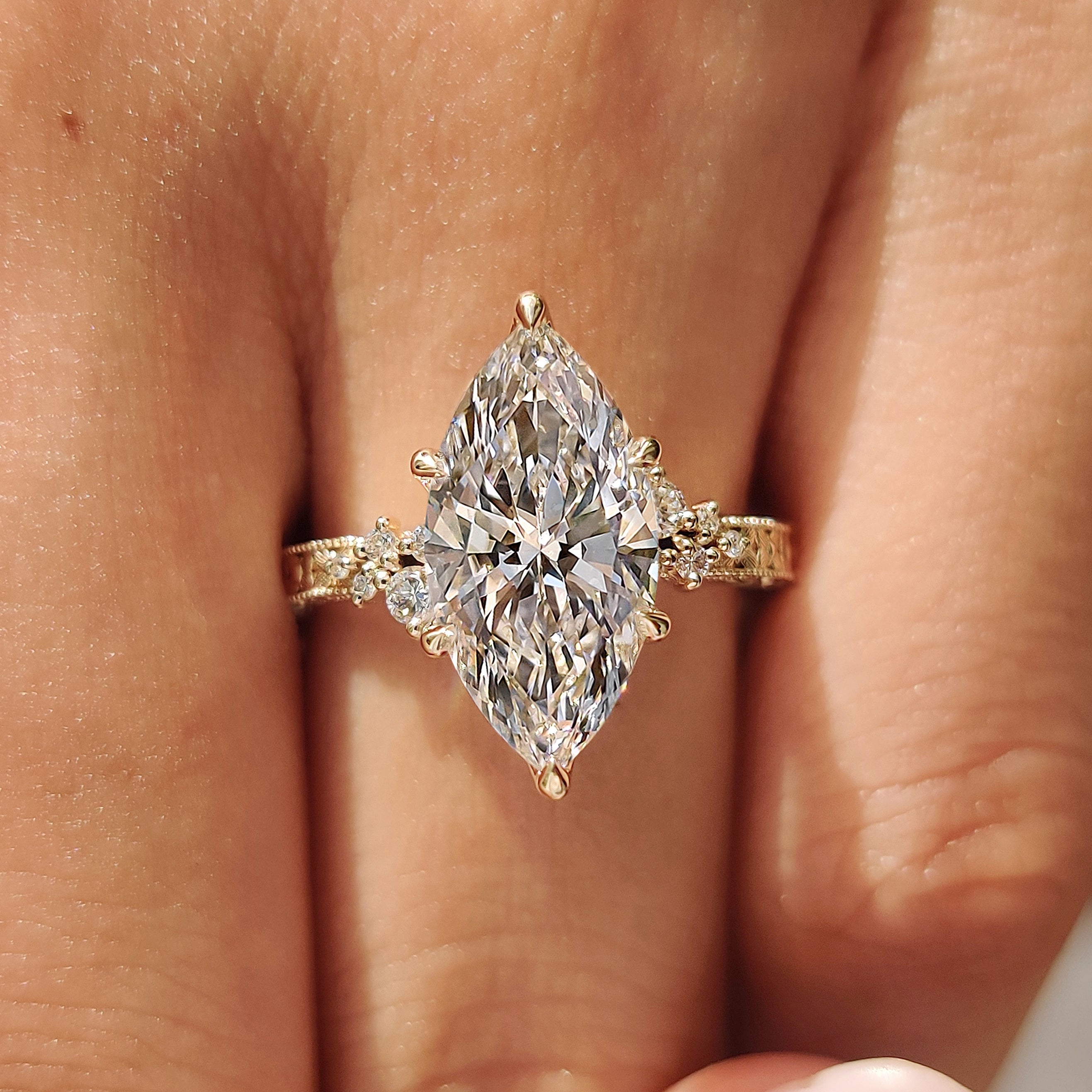 Handmade marquise cut diamond ring with filigree
