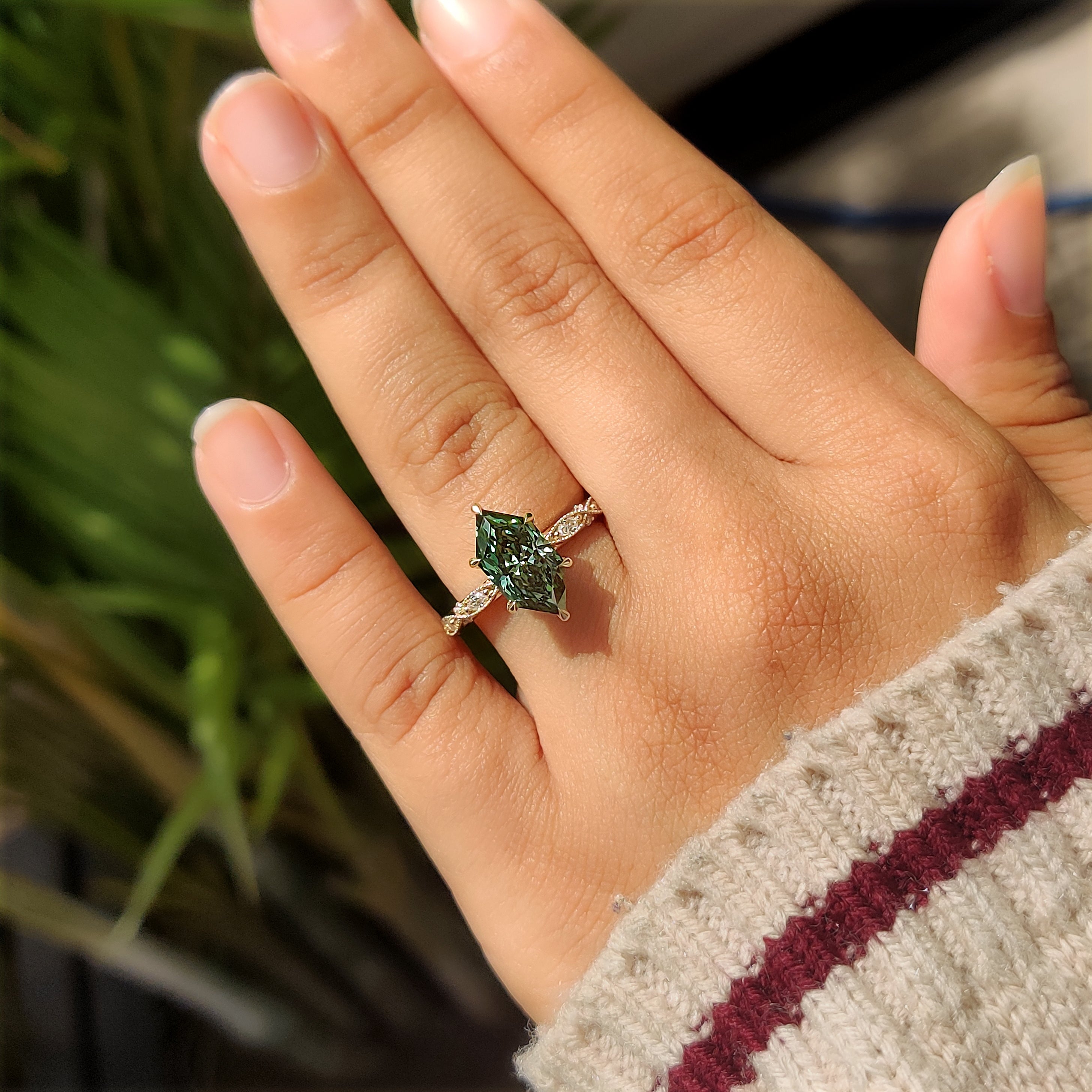 Green Dutch marquise lab grown diamond ring with milgrain details
