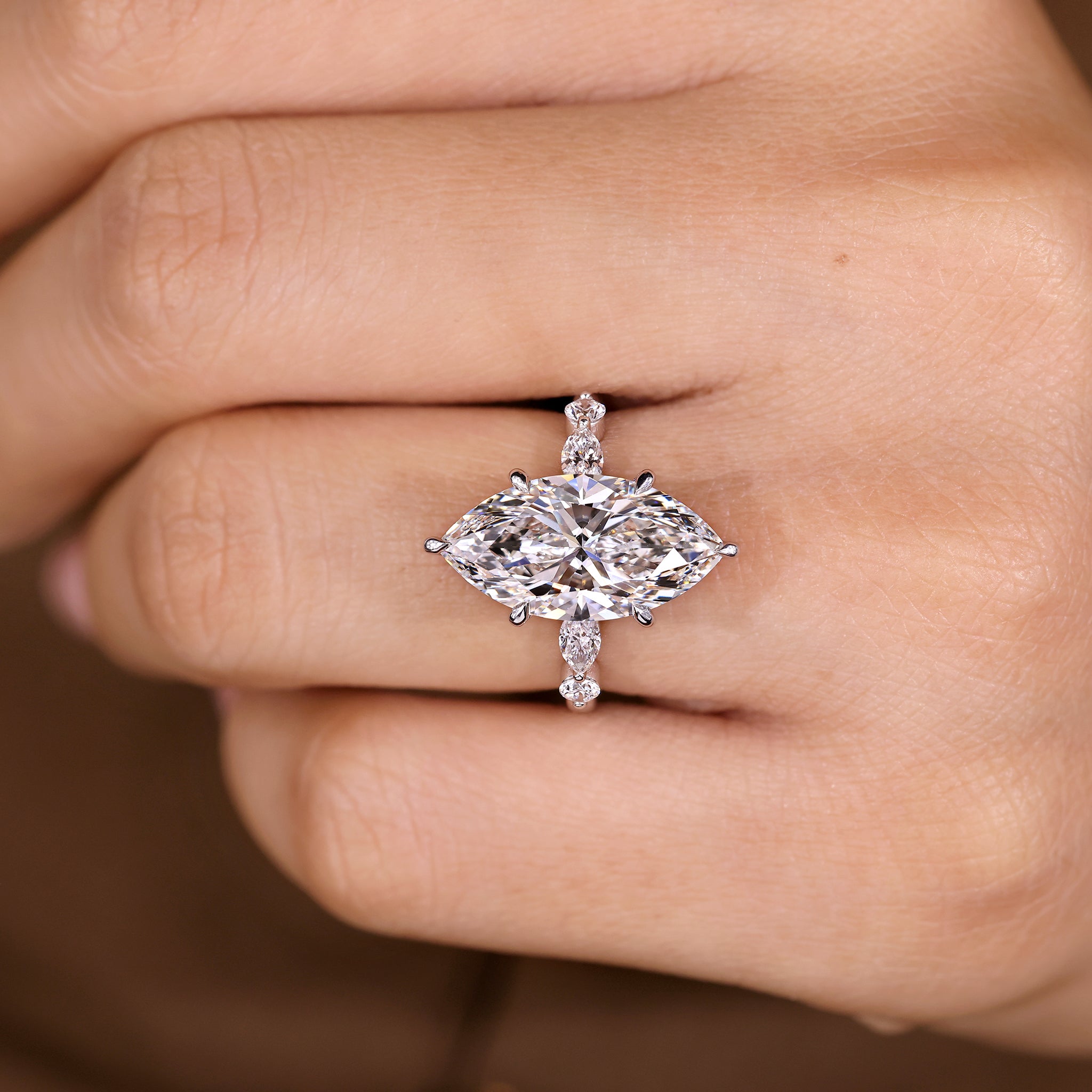 Five stone marquise diamond ring with shared prong setting
