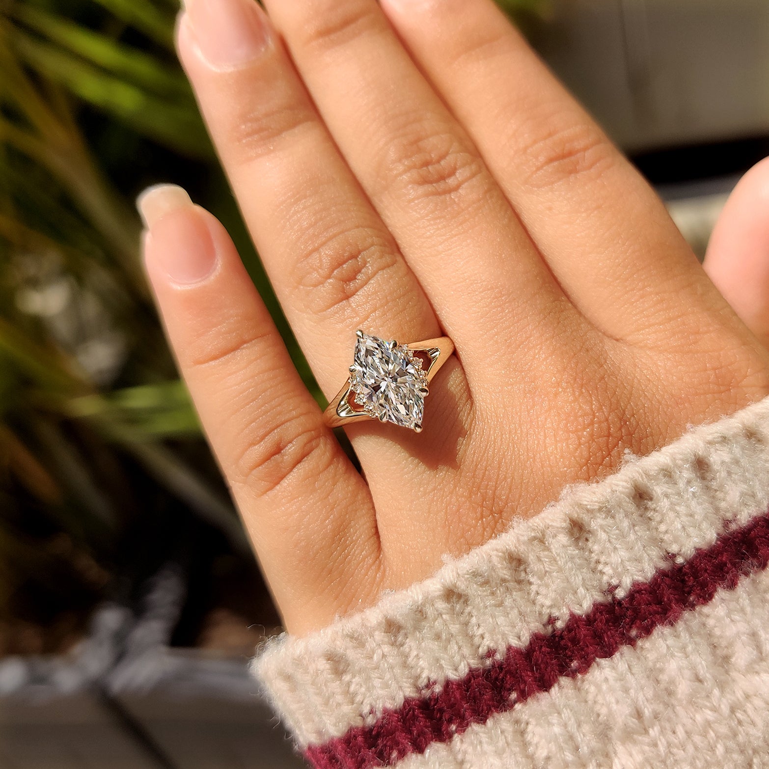 Lab grown marquise ring with hidden ruby flower detail
