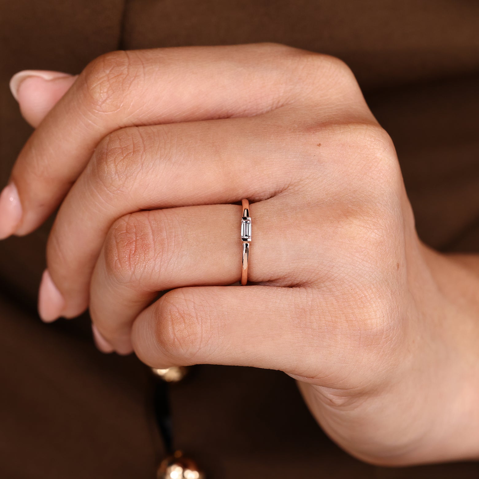 Lab grown diamond band with baguette solitaire stone setting
