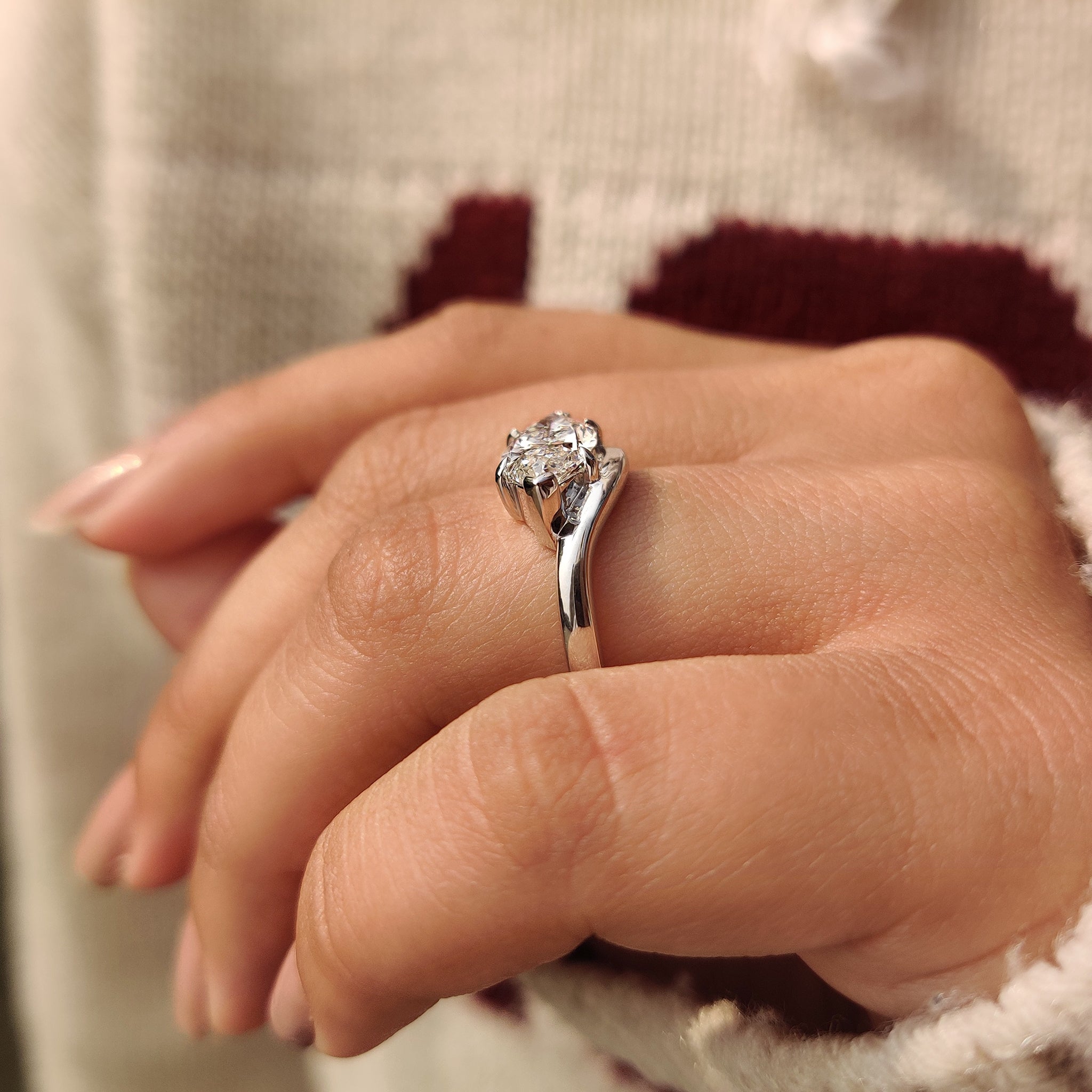 East to west marquise diamond engagement ring solitaire design
