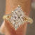 Dutch marquise diamond solitaire ring with filigree.
