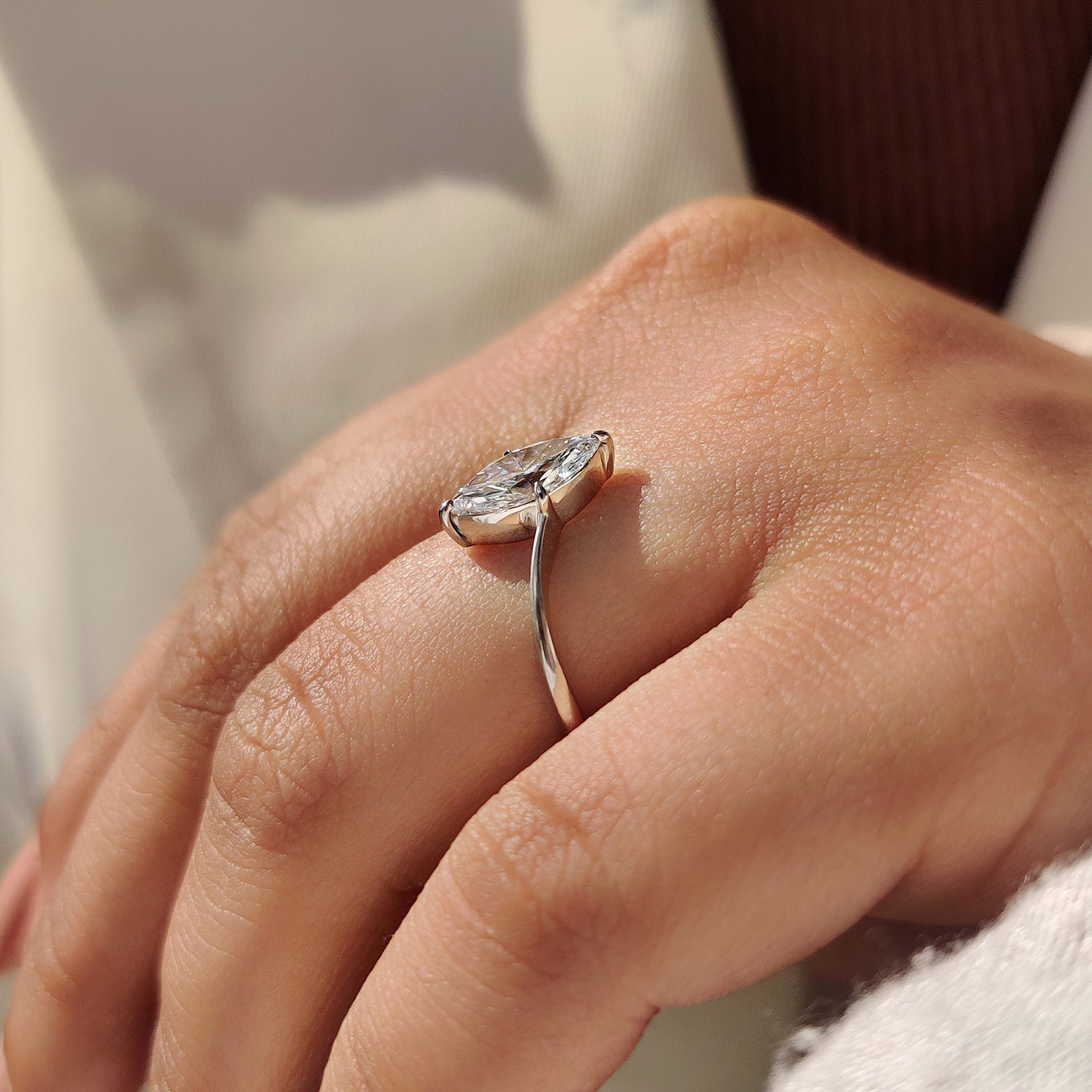 Lab grown marquise diamond ring with handmade detailing.
