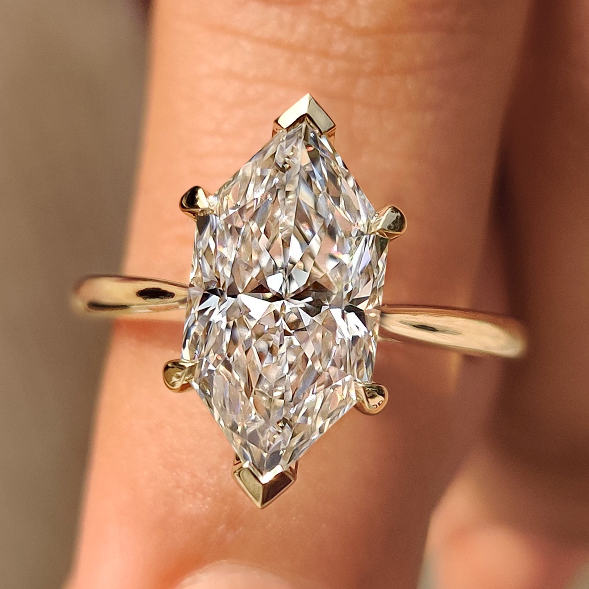 Dutch marquise lab grown diamond ring with tapered shank.
