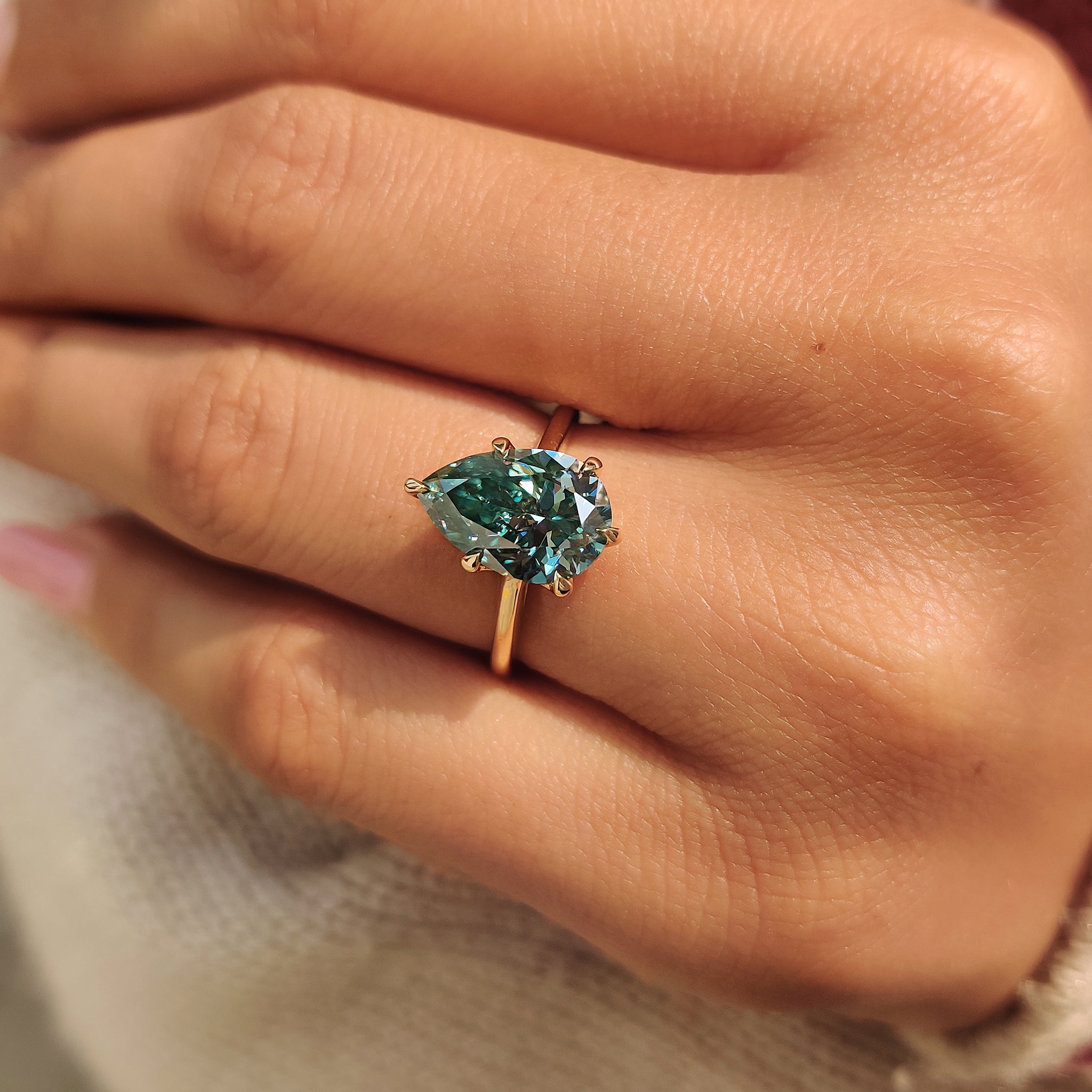 Pear cut ring with six claw prong setting.
