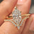 Solitaire ring with wedding band featuring dutch marquise diamond
