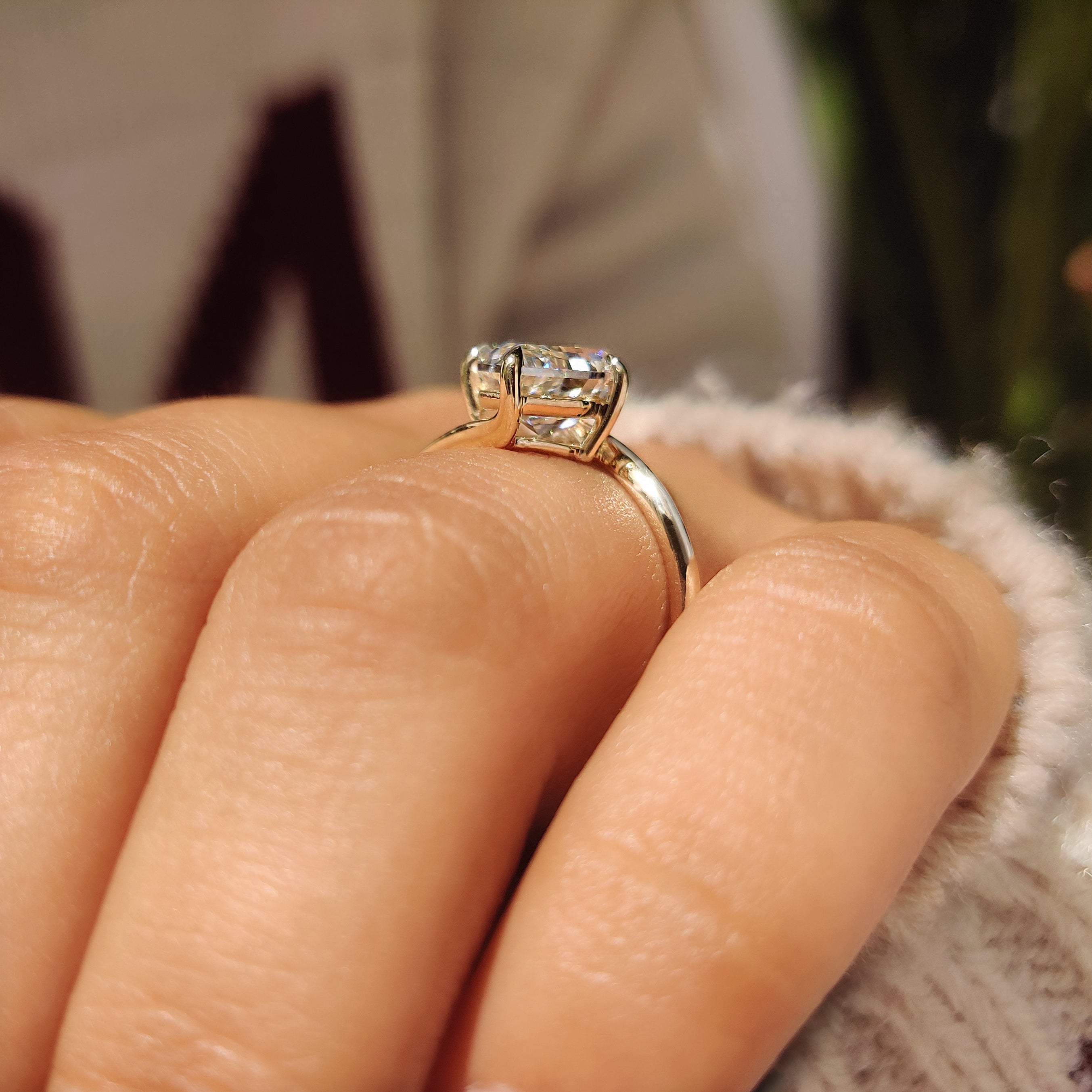 Pear cut diamond ring with bypass style band.
