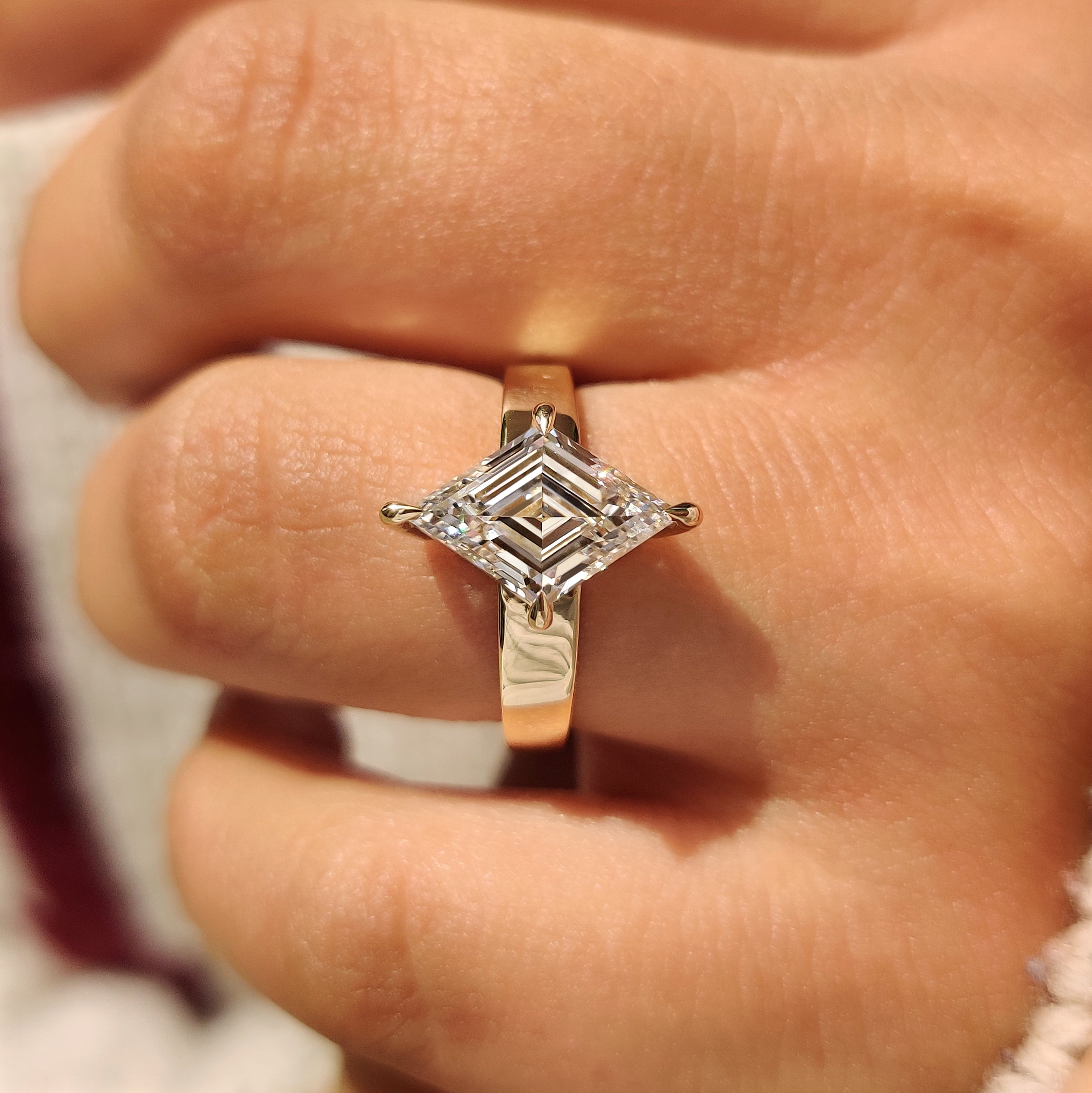Handmade lozenge diamond ring with tapered shank and prongs
