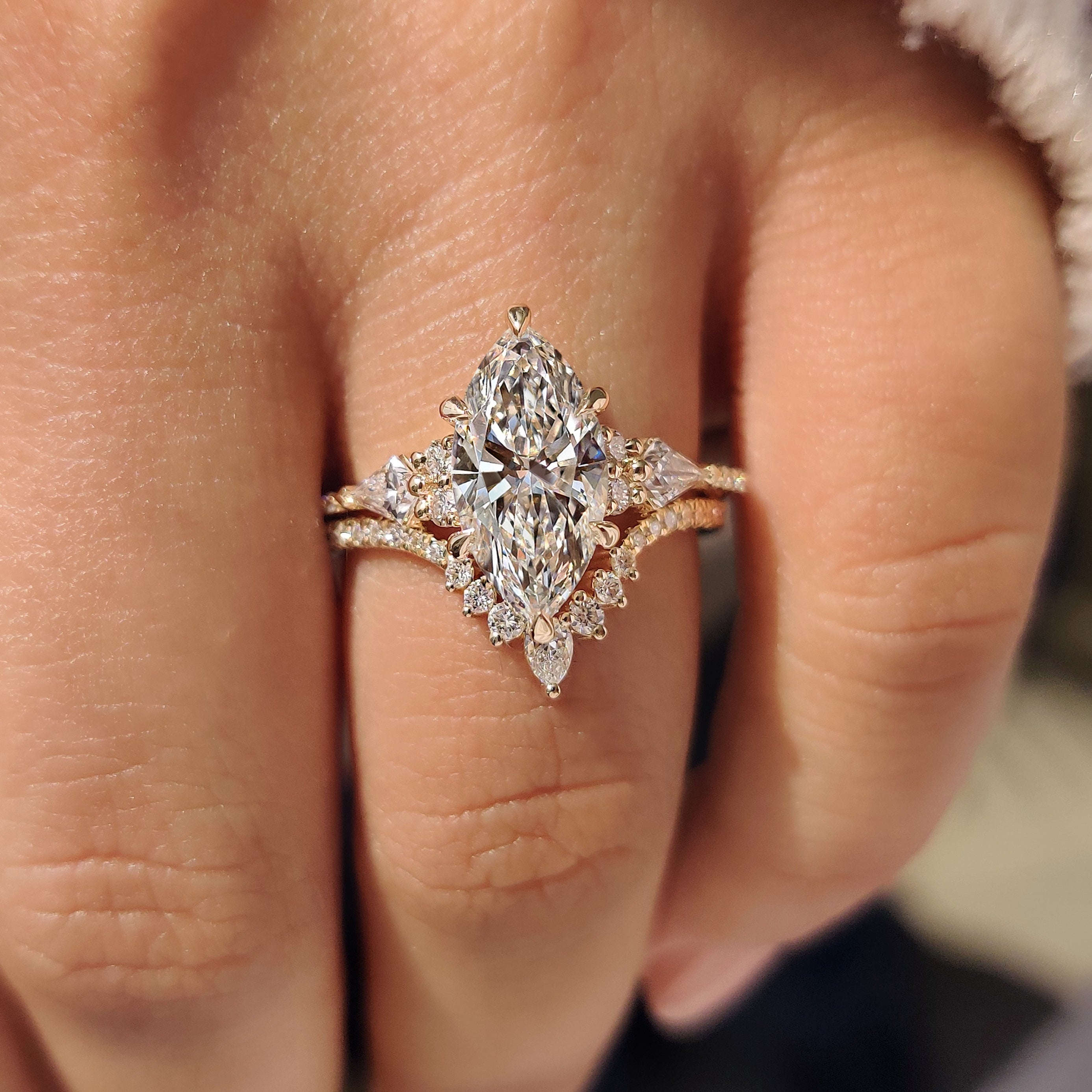 Marquise lab diamond ring with six claw prong setting.
