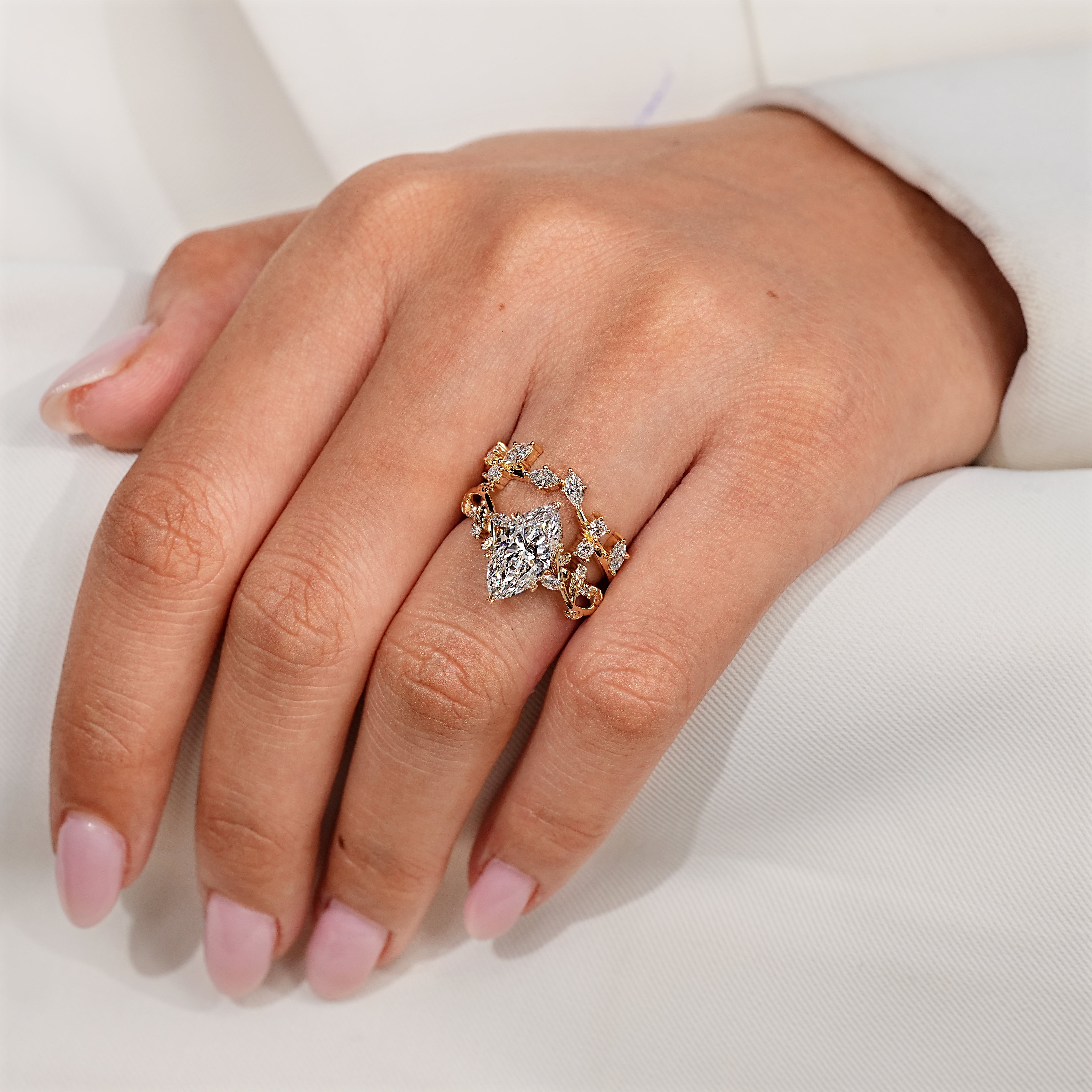 Marquise and round diamond wedding band.
