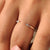 Four diamond style band with marquise and round stones.
