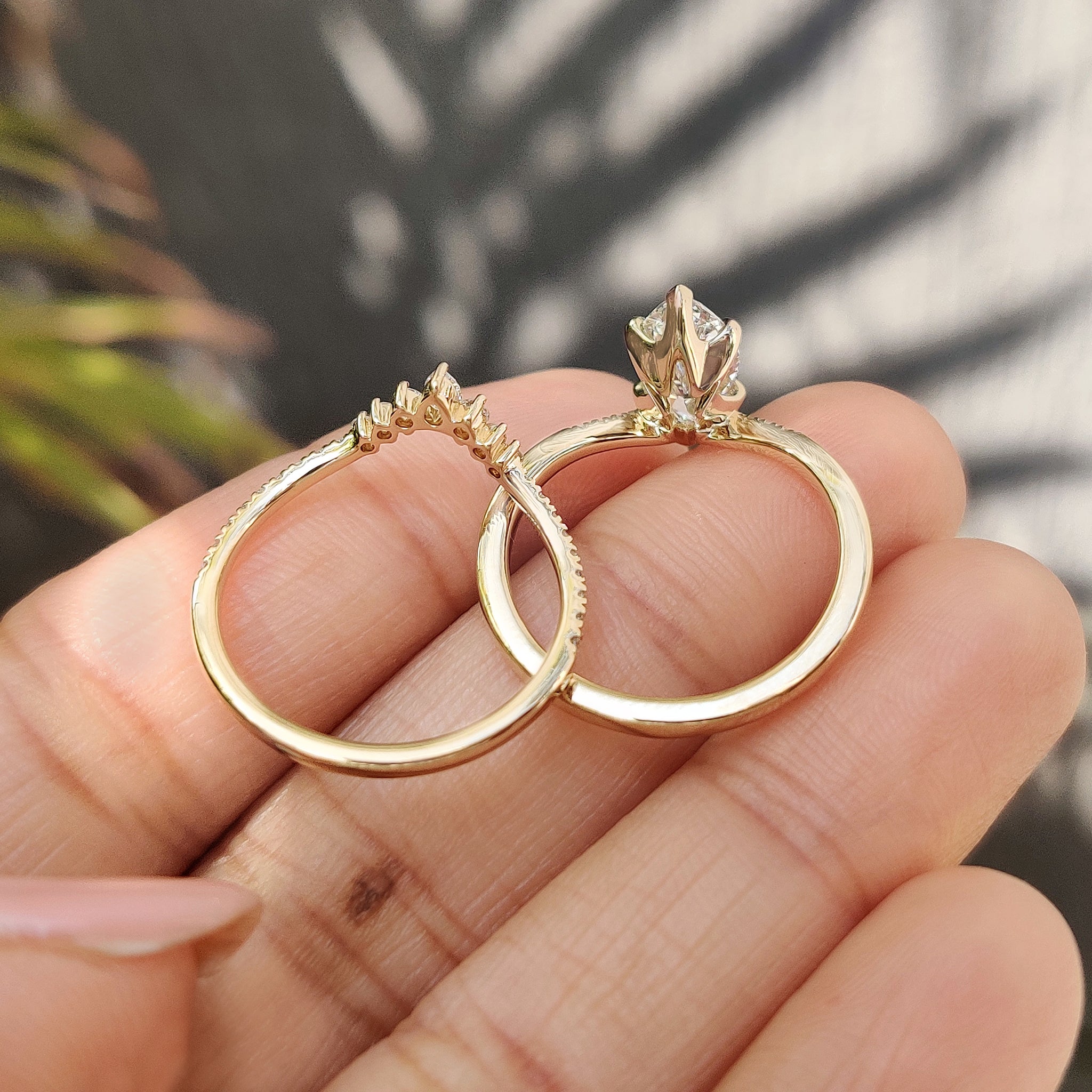 Tapered shank marquise ring with band.
