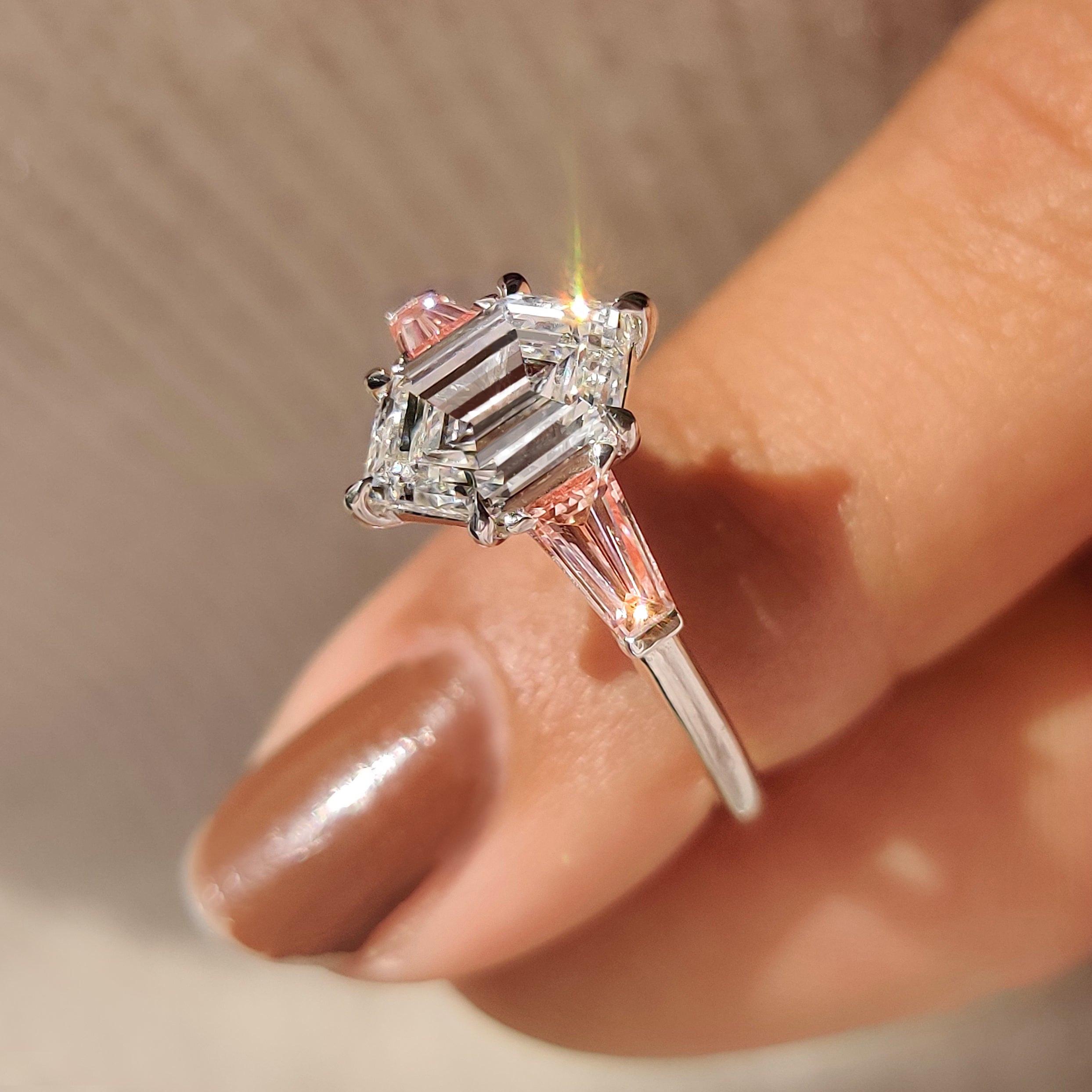 Lab grown three stone diamond ring with step center
