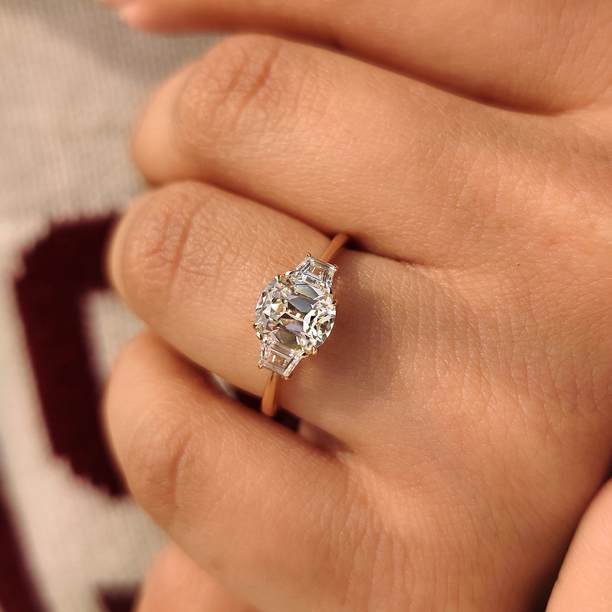 Lab grown cushion cut diamond ring with four claw prong
