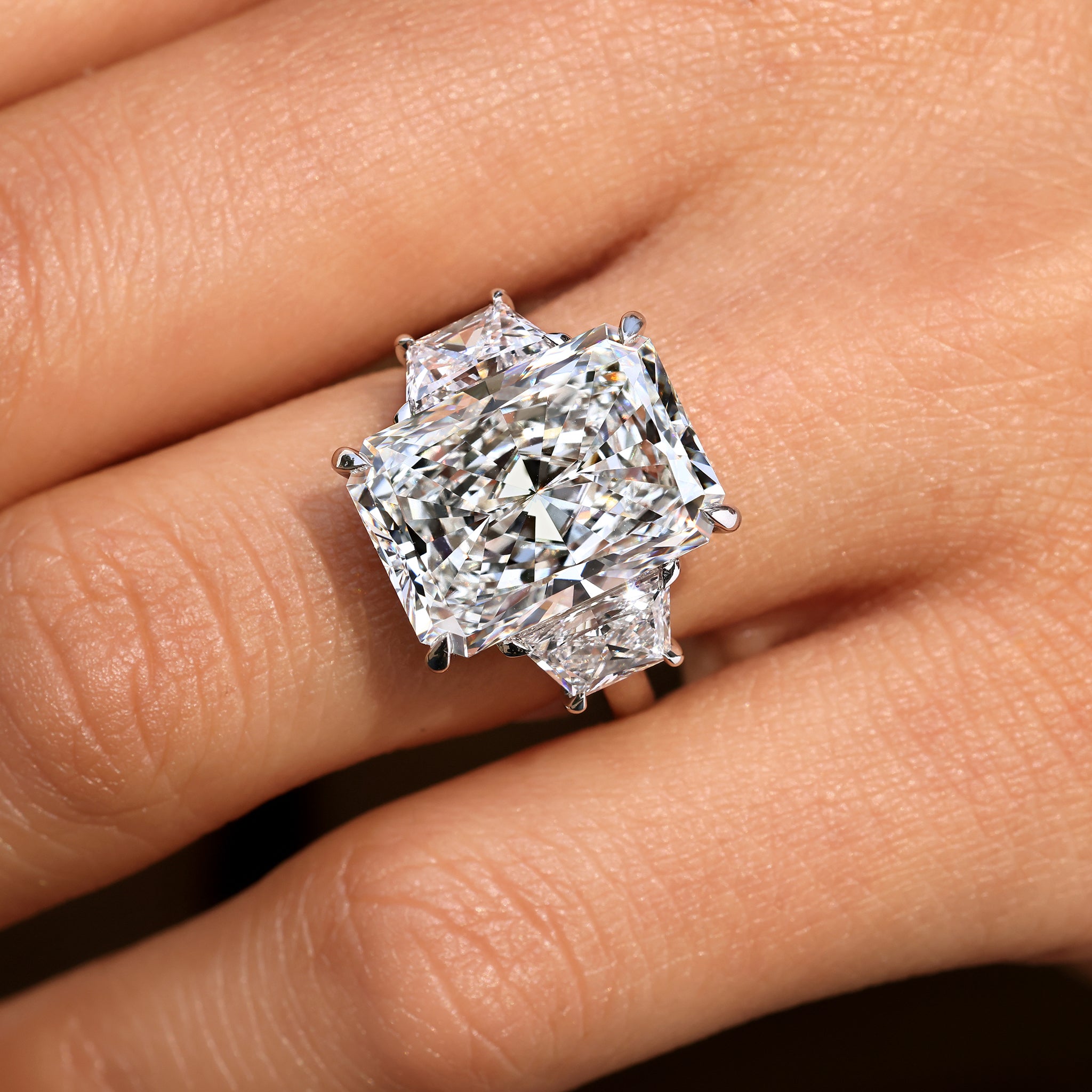 Lab grown radiant cut diamond ring with modern prong design.
