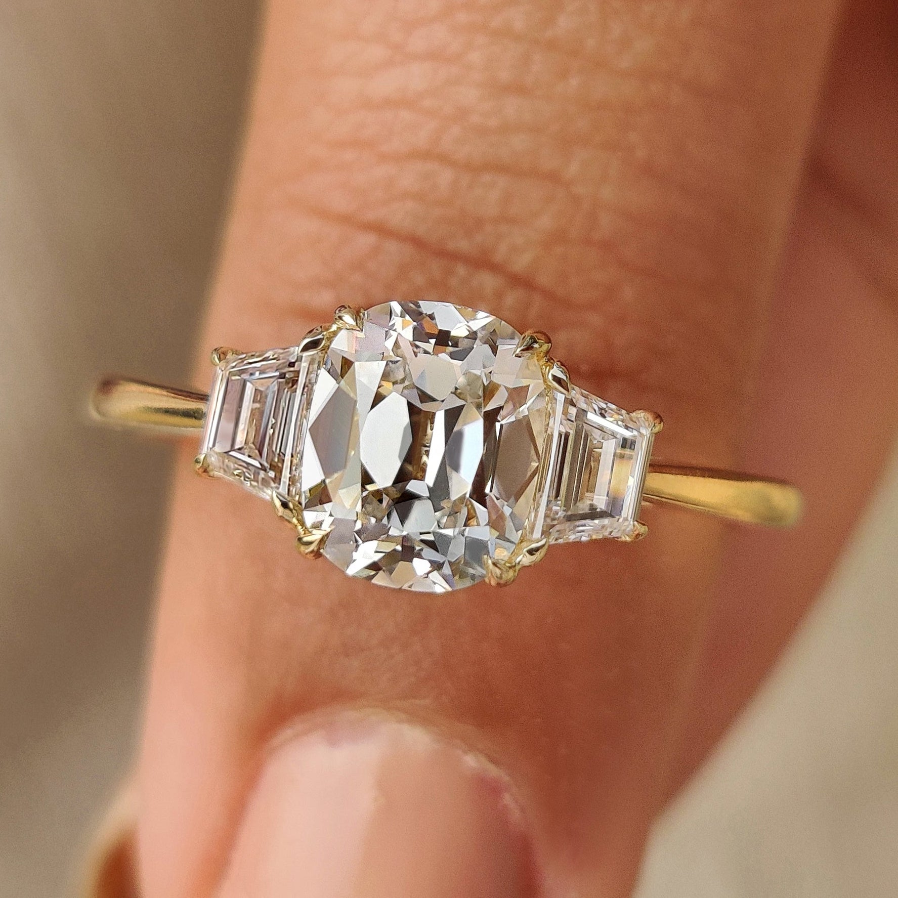 Cushion cut diamond ring with old Mine cut center stone
