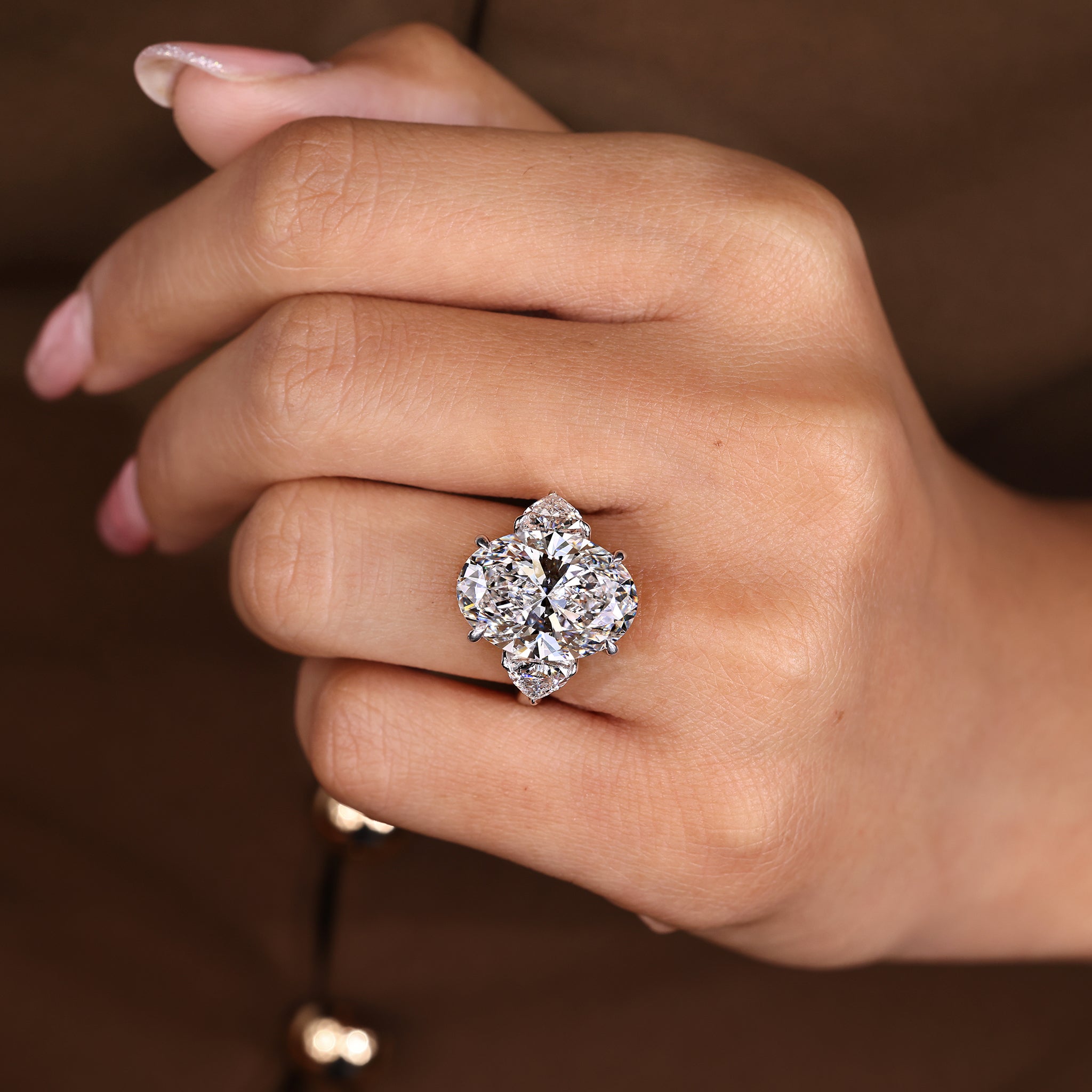 IGI Certified 10 -15 Carat Oval Diamond Ring in Three Stone Style