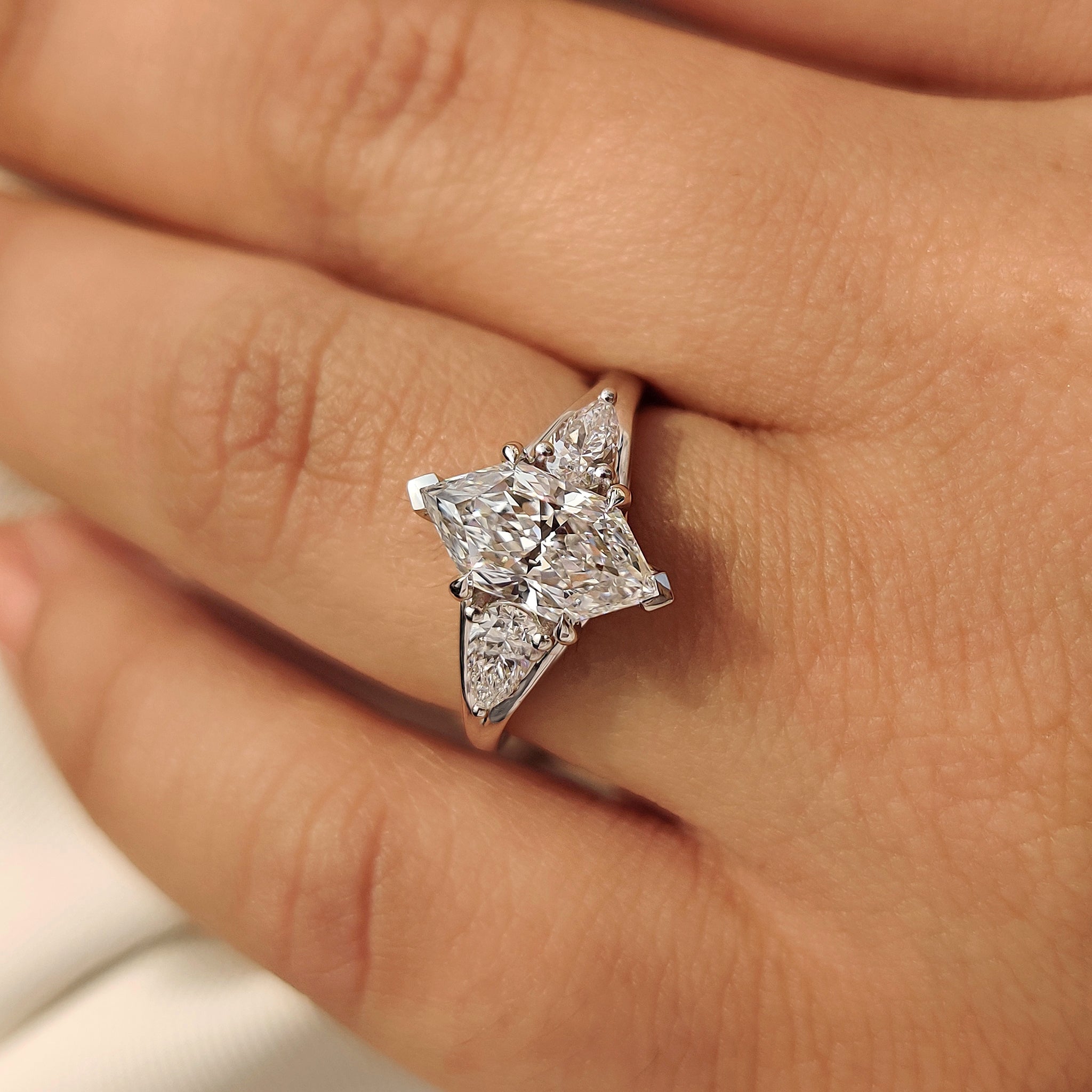 Handmade dutch marquise diamond ring with four claw prongs.

