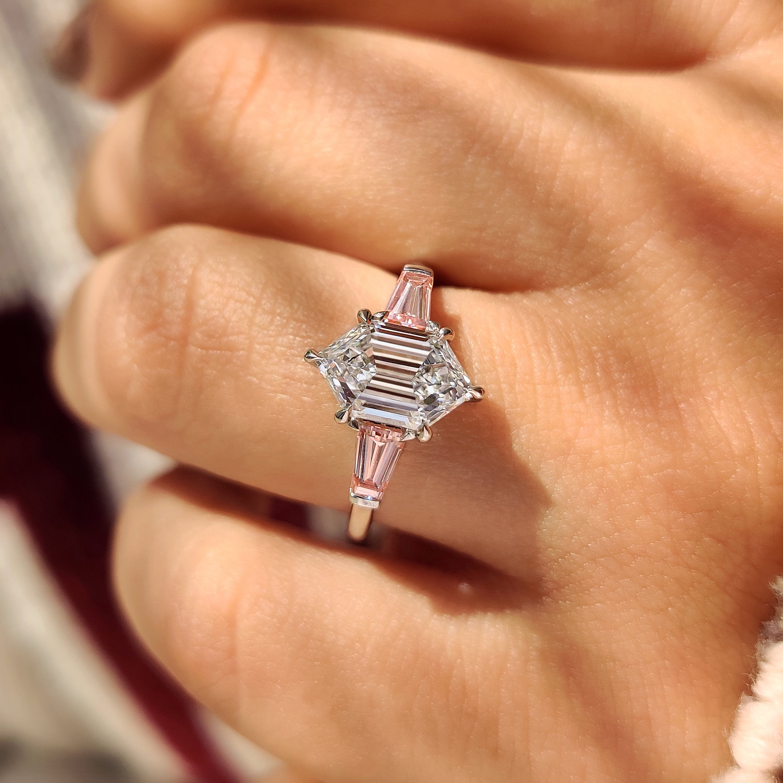 Lab grown diamond engagement ring with three stone design
