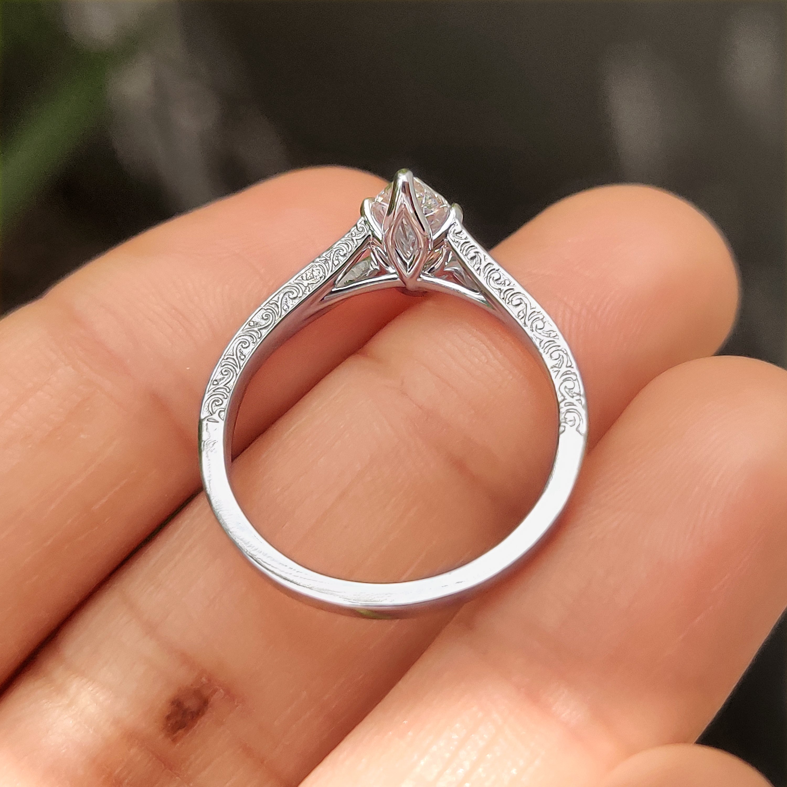 Lab grown marquise diamond ring with vintage tulip setting.
