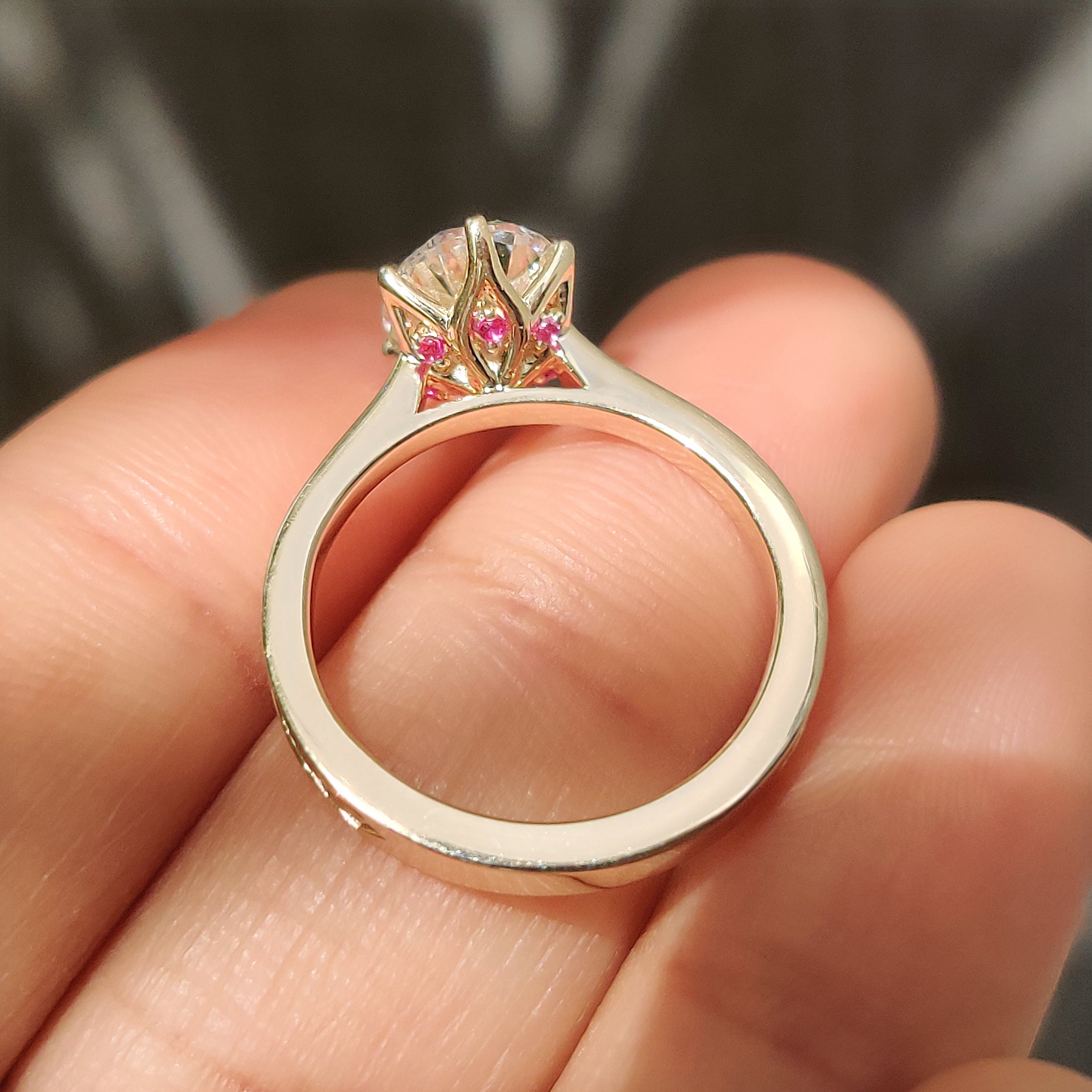 Oval diamond engagement ring with art deco engraved band

