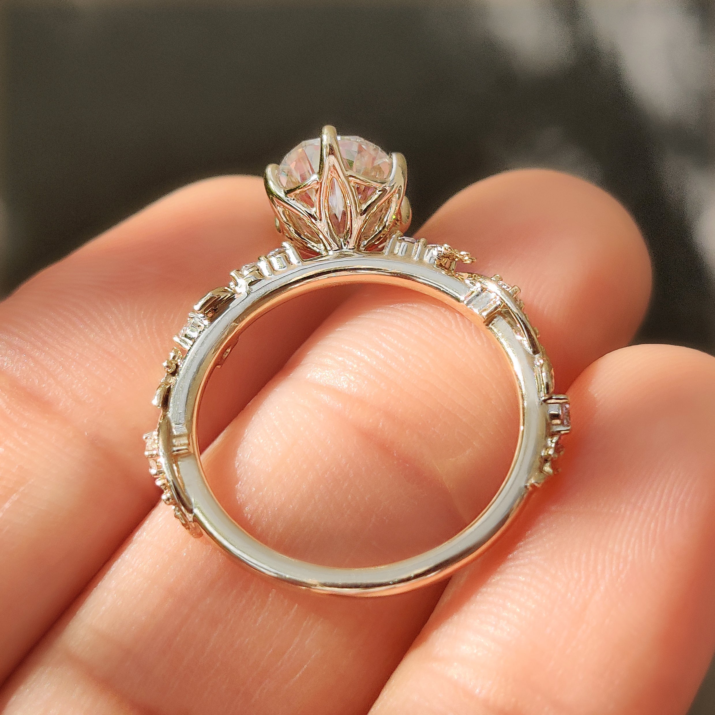 Oval lab grown diamond ring with Sakura flowers.
