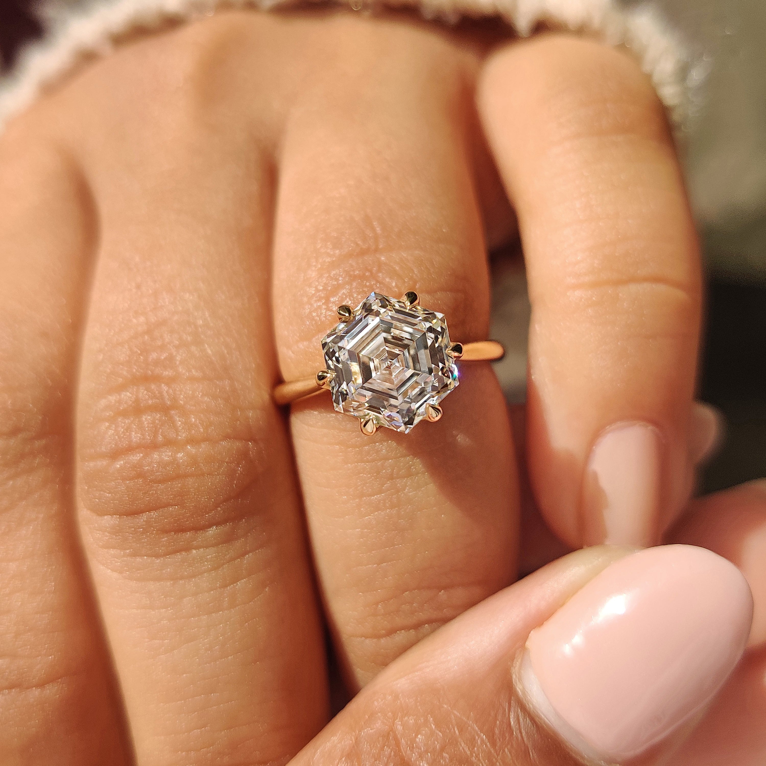 IGI certified hexagon diamond ring with six claw prongs
