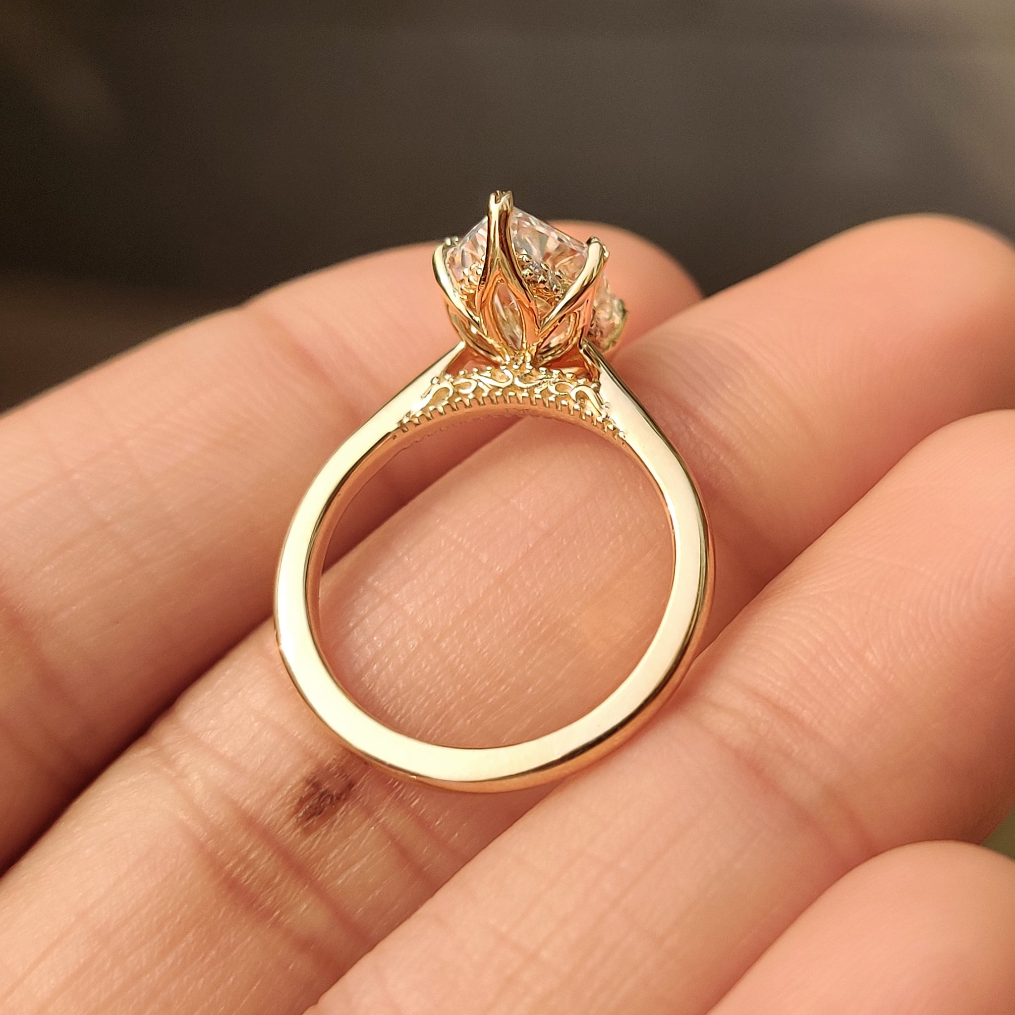 Lab grown dutch marquise engagement ring with hidden halo.

