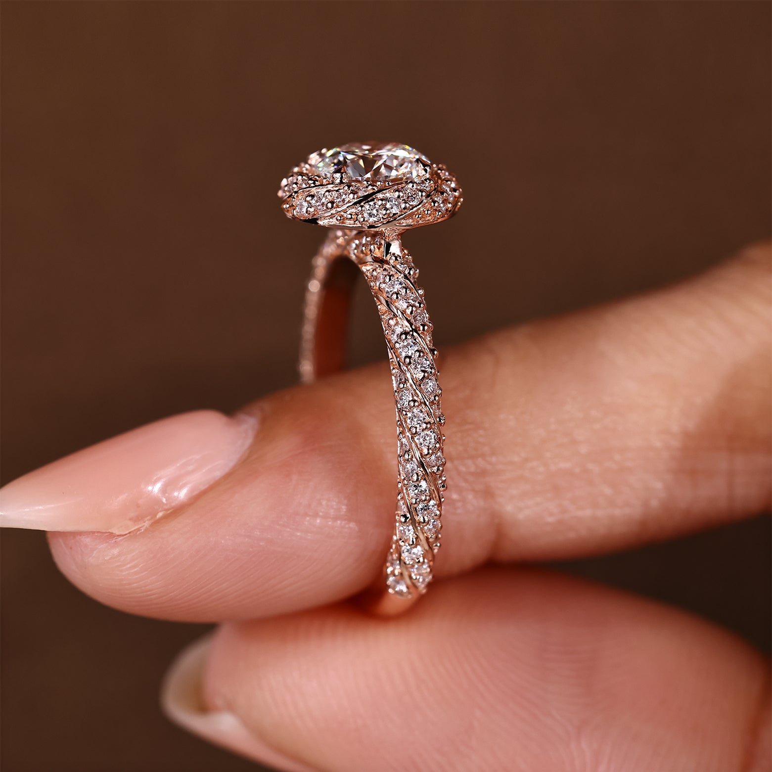 Handmade round diamond ring with four claw prong setting
