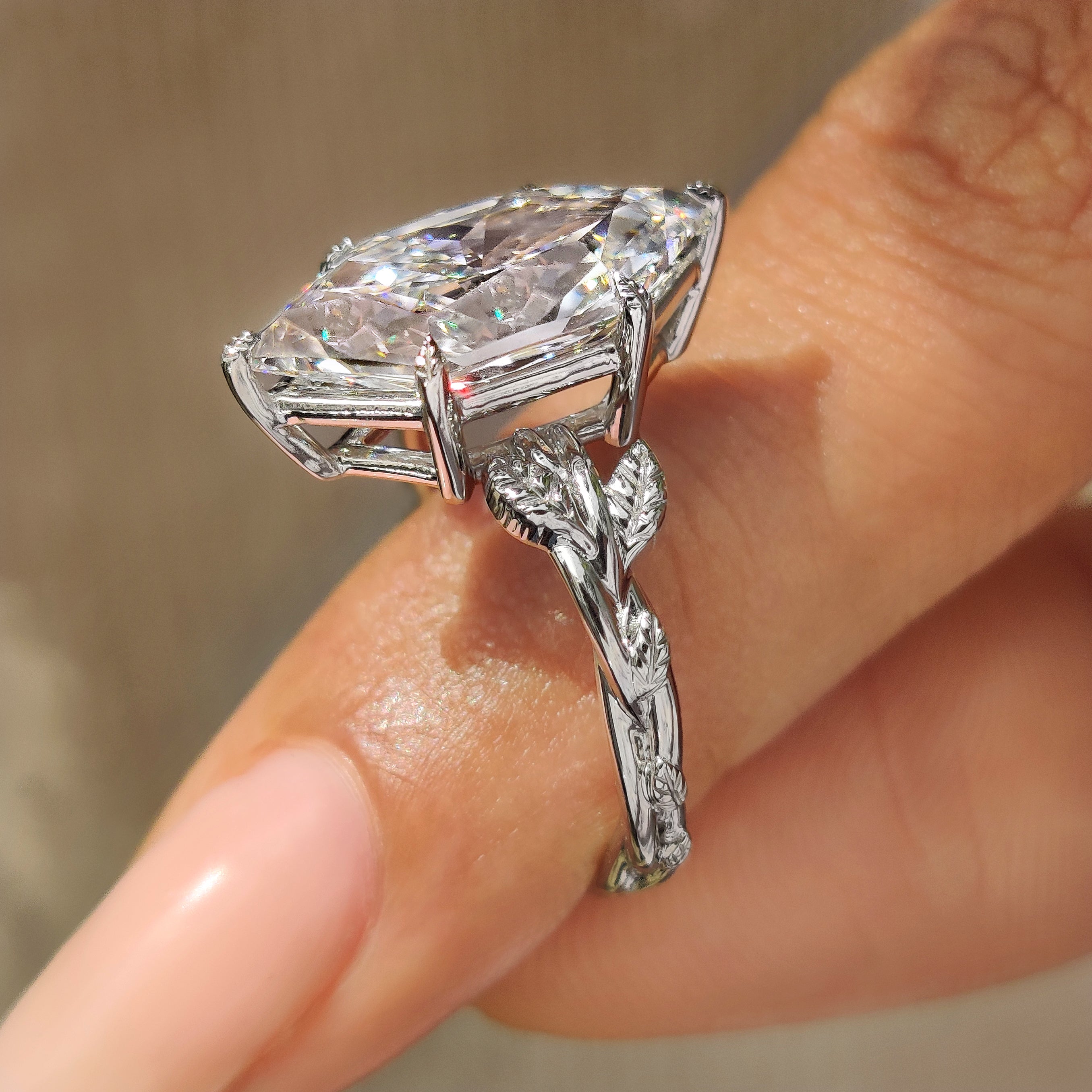 Nature inspired ring with Dutch marquise center diamond
