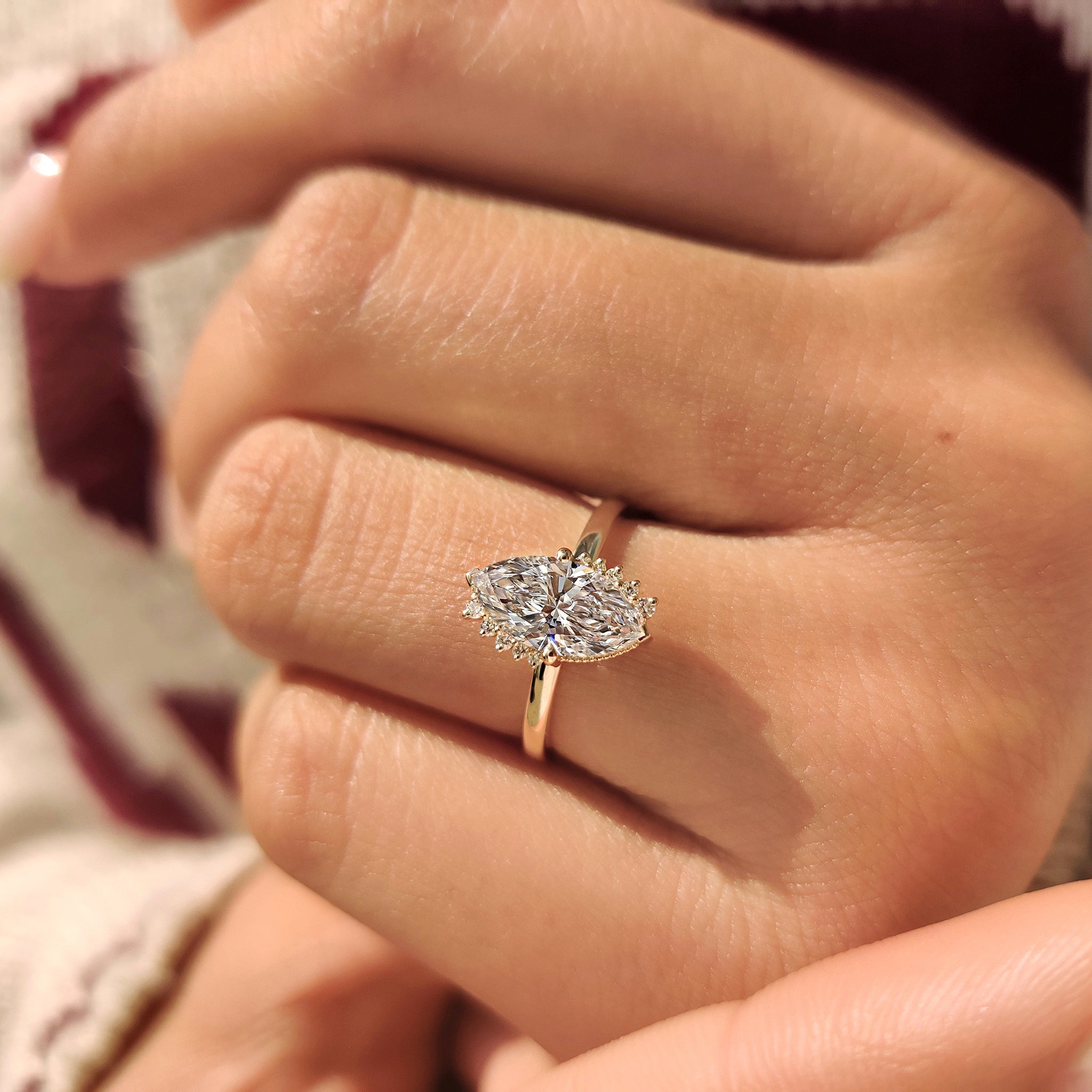Lab grown marquise diamond ring with V shaped prongs.
