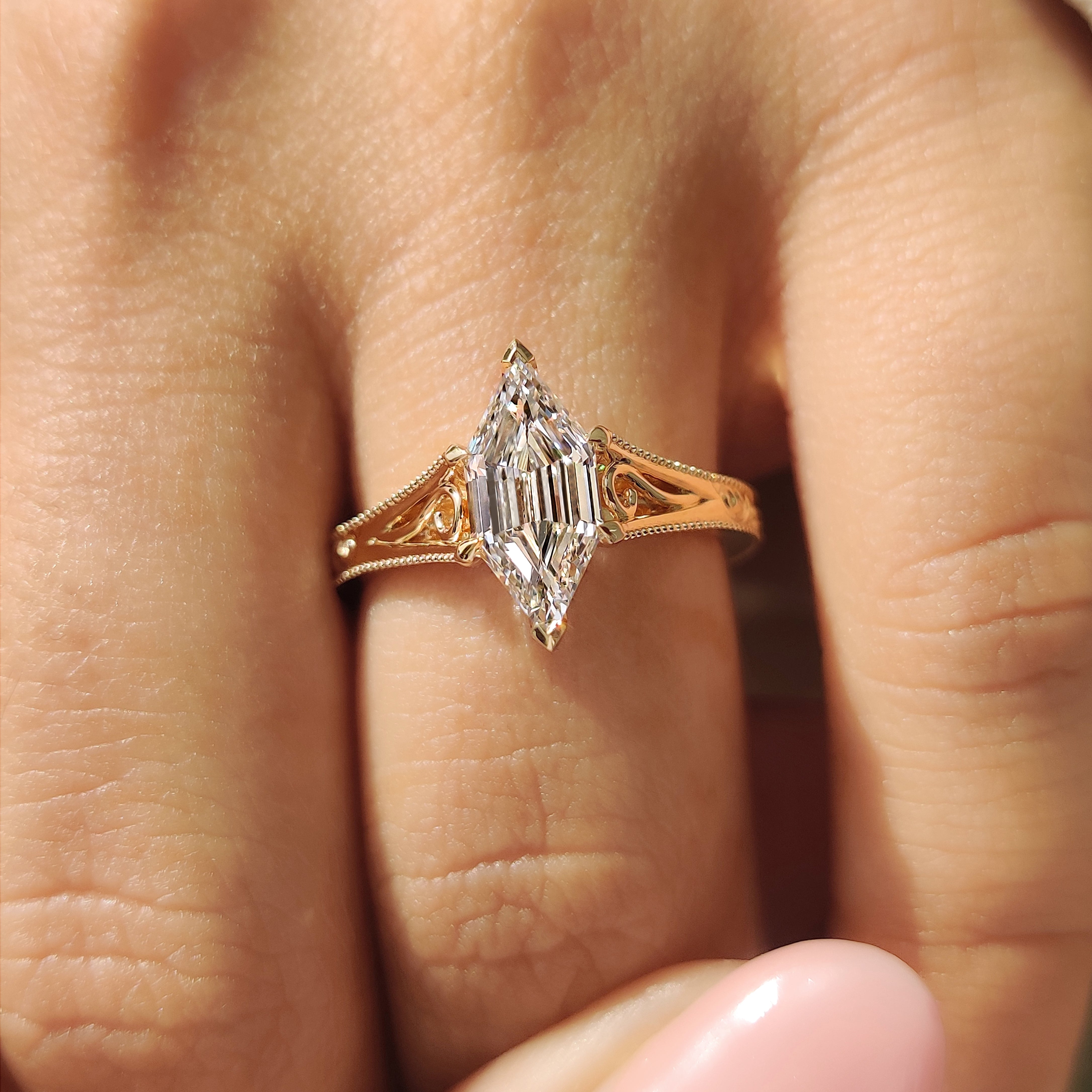 Lab grown hexagon diamond ring with four claw prong setting
