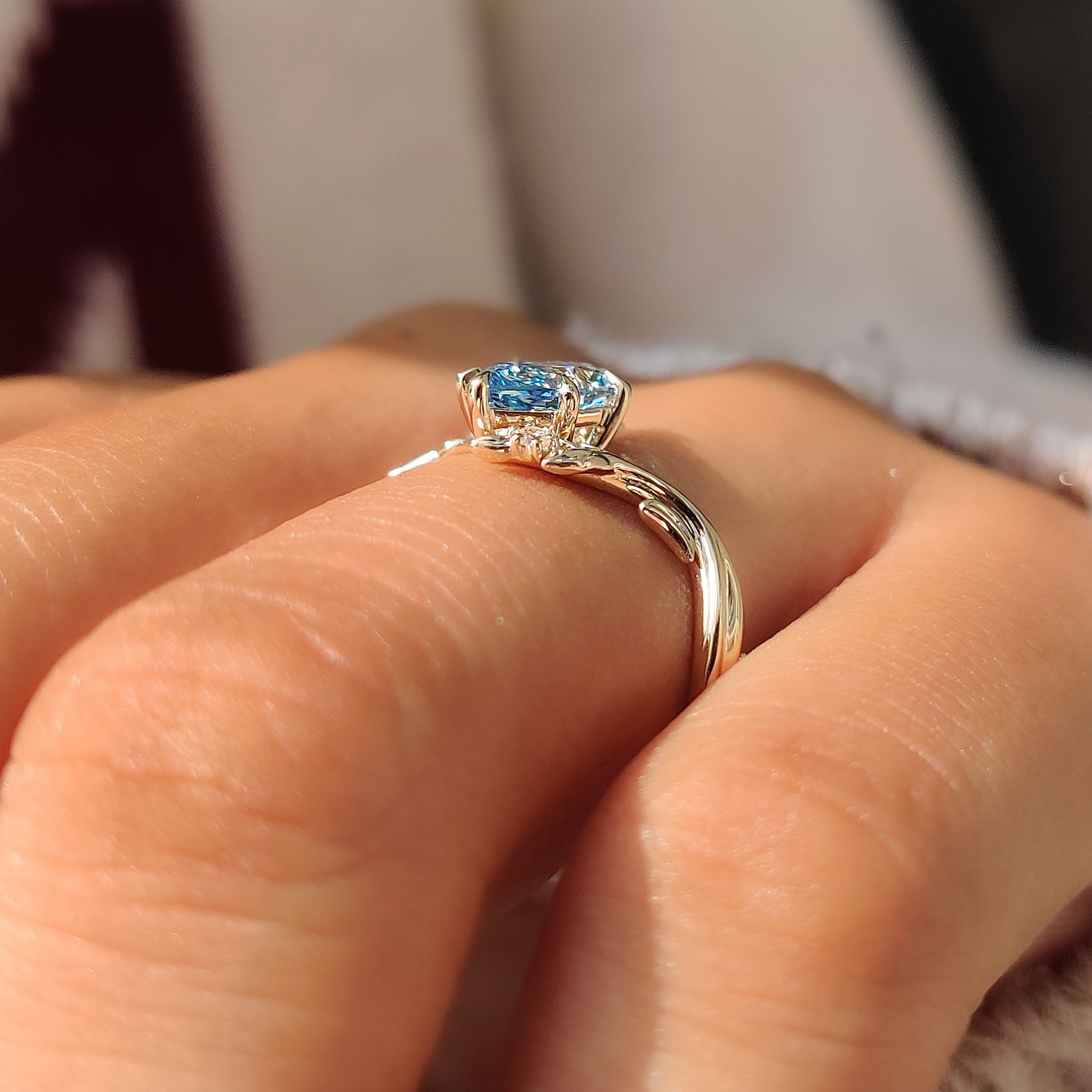 Six claw prong setting secures your blue Dutch marquise cut diamond.
