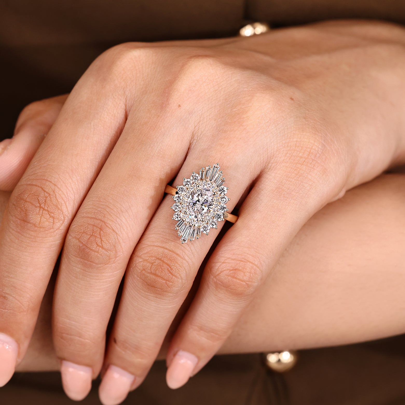 Lab grown oval ring with baguette and round halo stones
