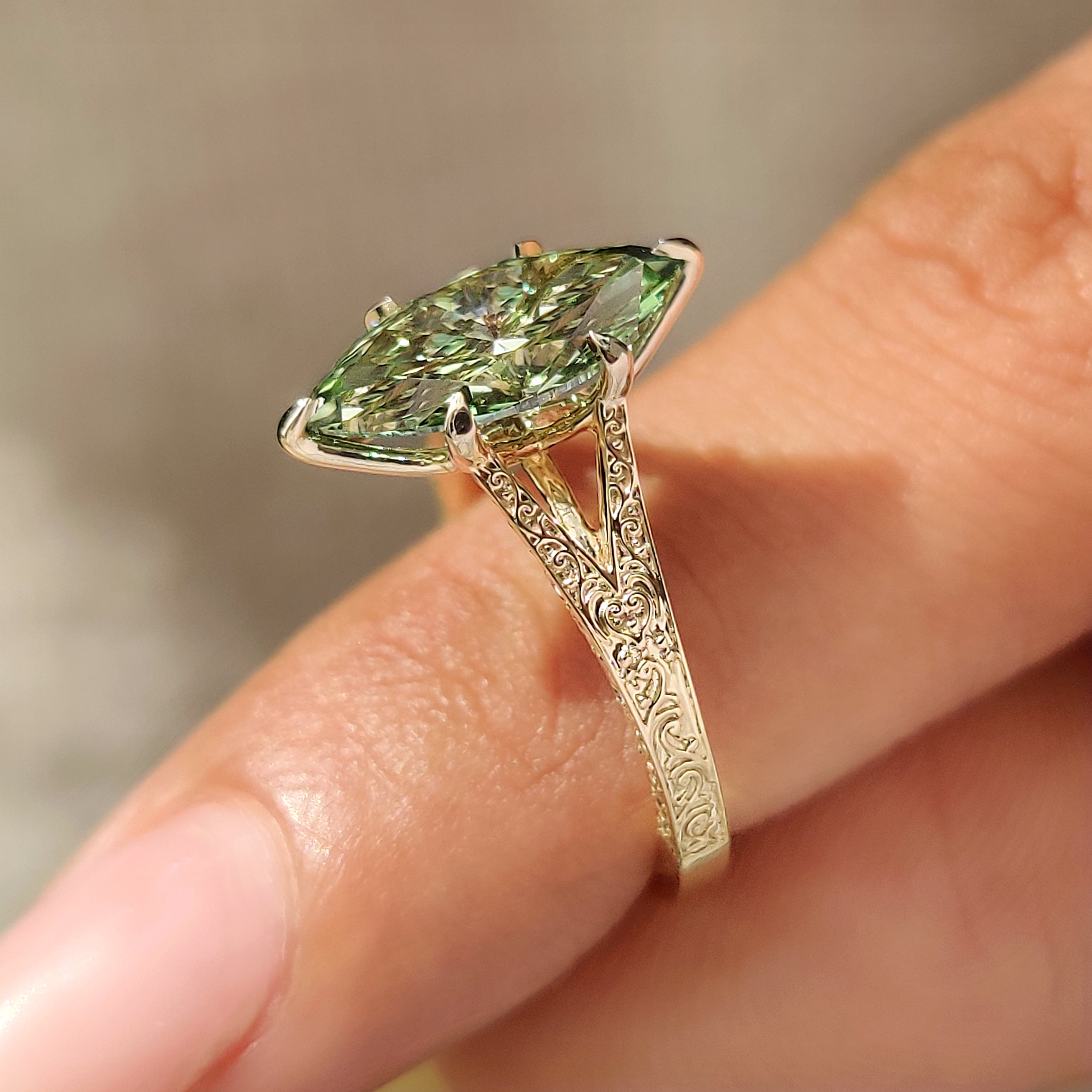 Green marquise diamond ring with tulip and split shank