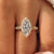 Round and marquise pave setting on a vintage inspired ring band.
