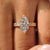 Round pave diamonds set along a vintage ring band.
