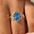 Oak leaf and acorn motifs along yellow gold ring shank.
