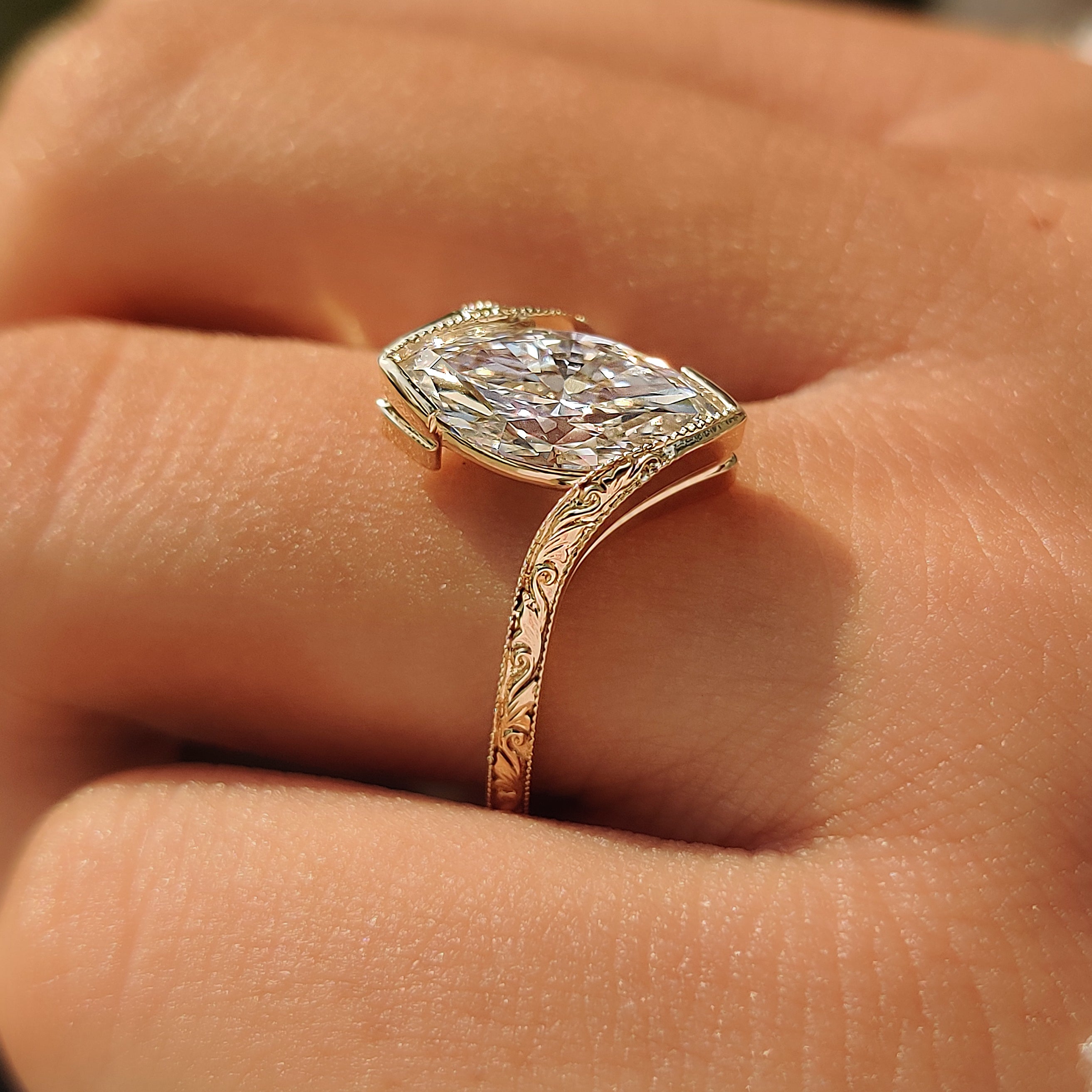 Handmade marquise solitaire ring by Carat Diamonds.
