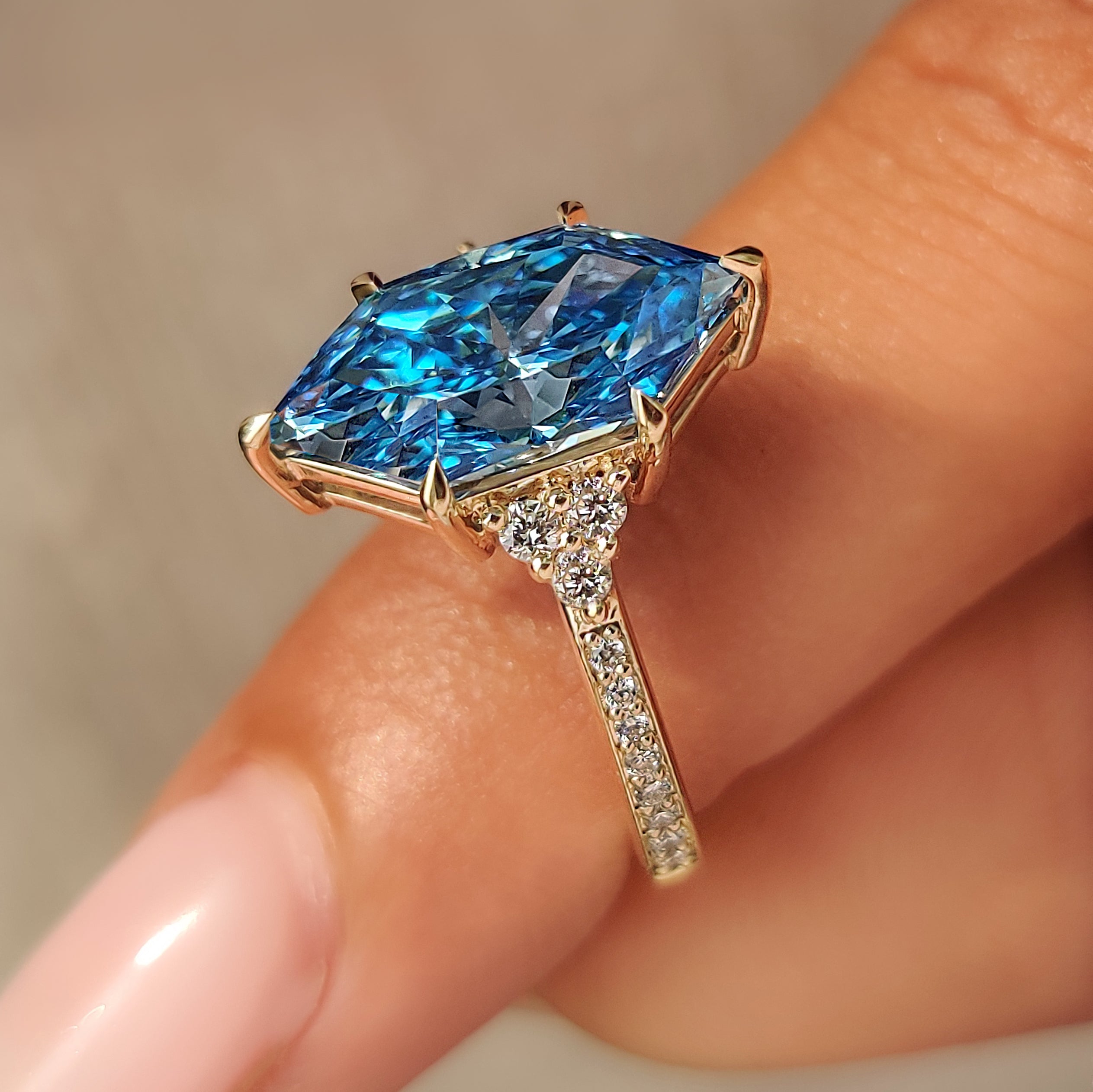 Dutch marquise diamond cluster ring viewed from the side.
