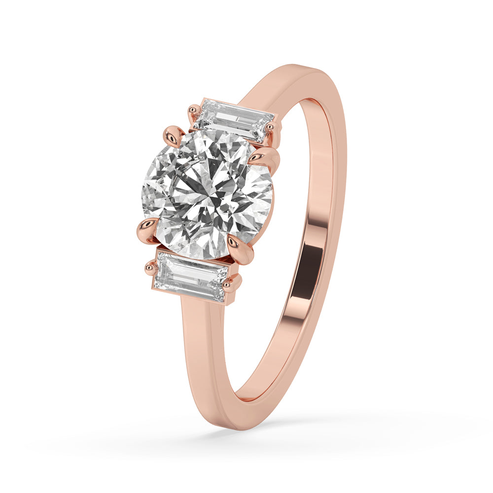 2 ct round diamond engagement ring with a sleek cathedral setting and elegant diamond baguette accents.
