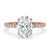 Oval hidden halo engagement ring featuring a dazzling oval diamond with pave setting for timeless elegance and sparkle.
