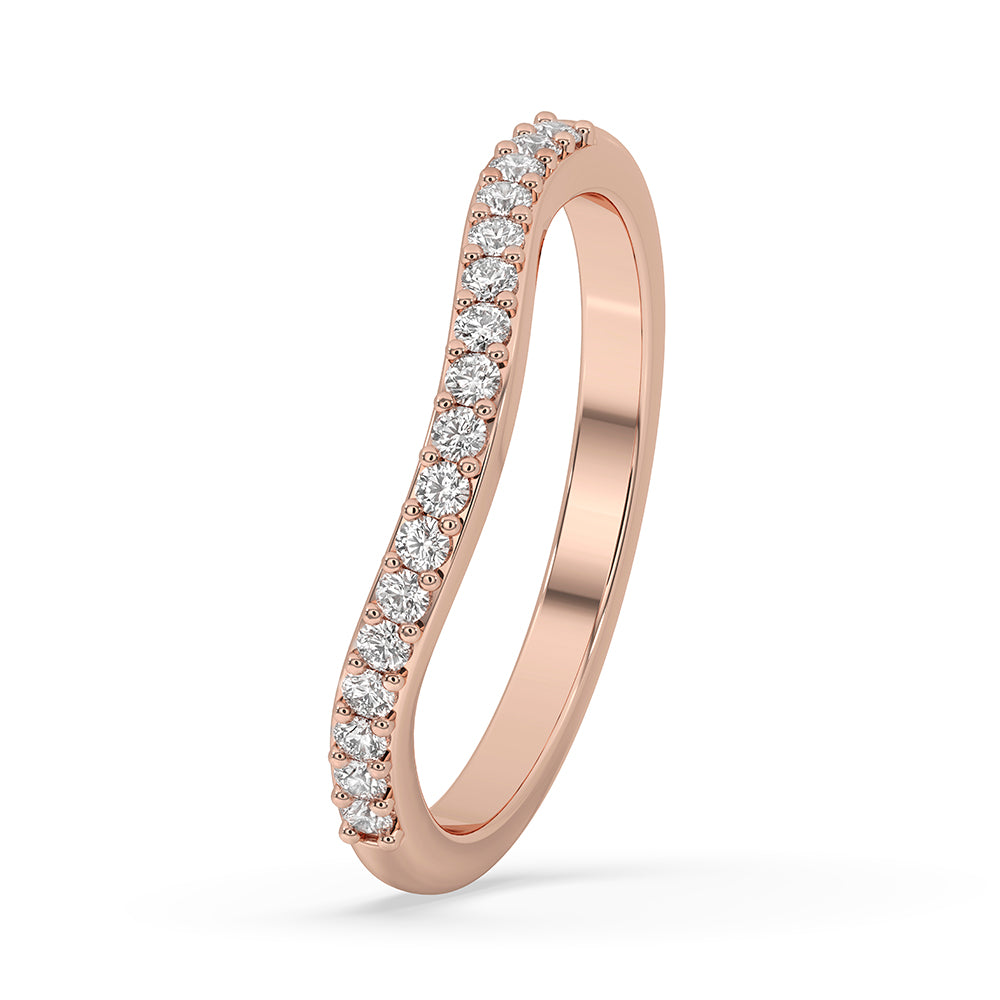 Curved wedding band paired with stackable wedding band in custom wedding band design.
