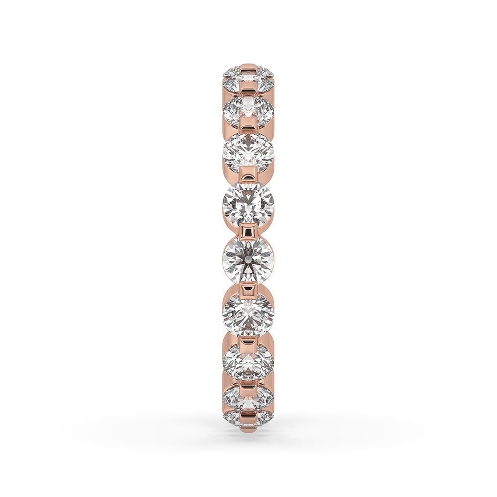Full eternity band with diamonds encircling the entire ring.
