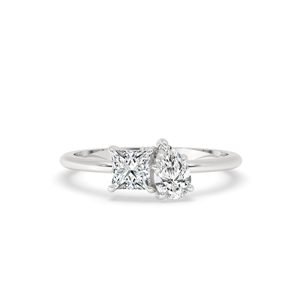 2 Stone Diamond Ring featuring a pear and princess cut diamond in a white gold claw prong ring setting.
