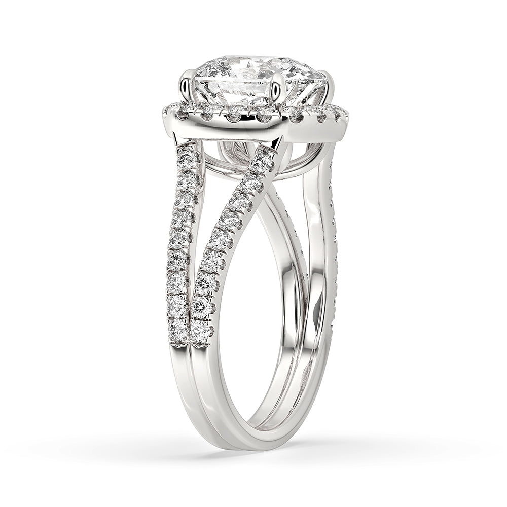 Halo round cut ring set featuring a split shank pave design.
